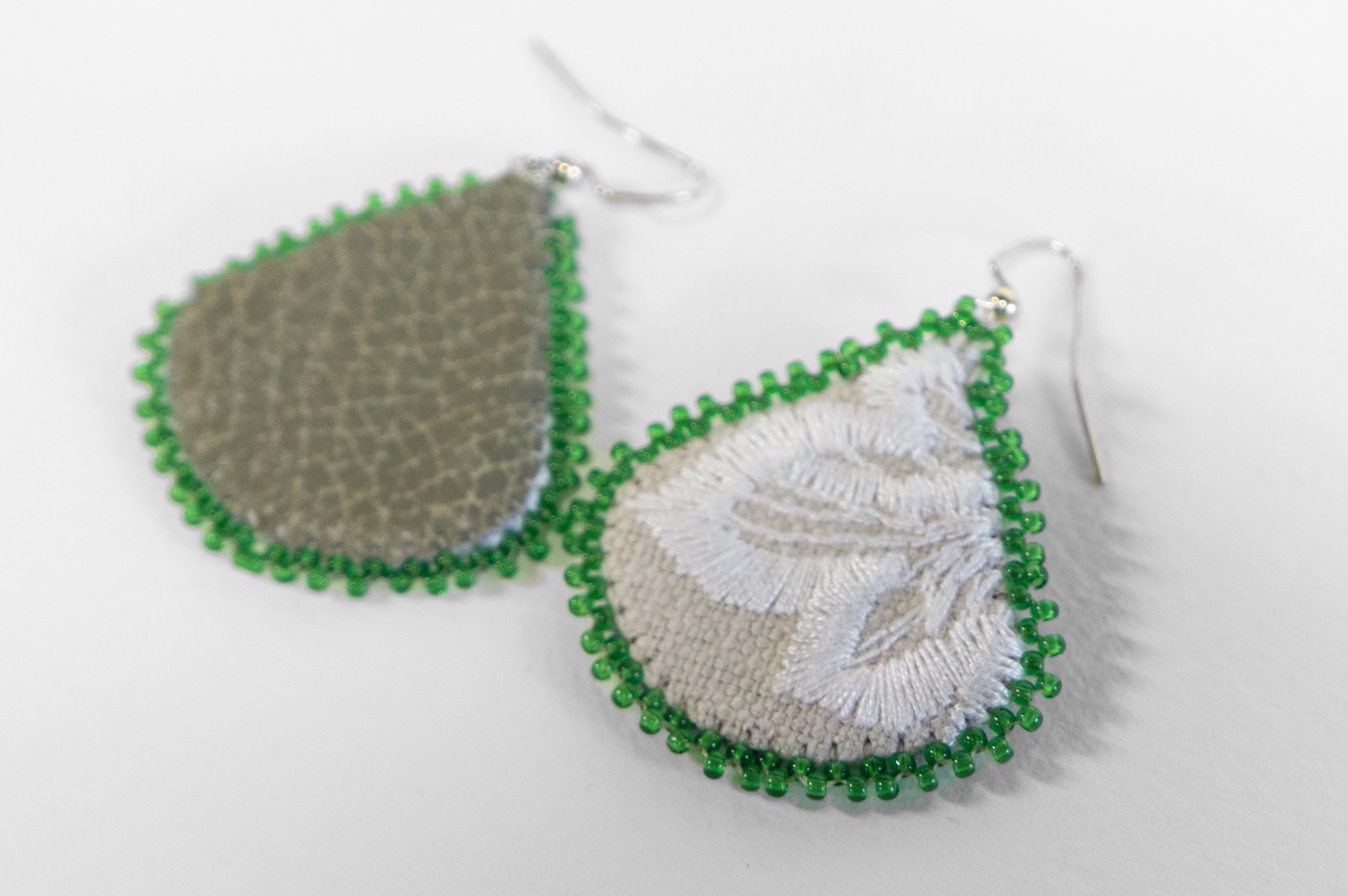 Green edge embroidered earrings by Hattie Lee