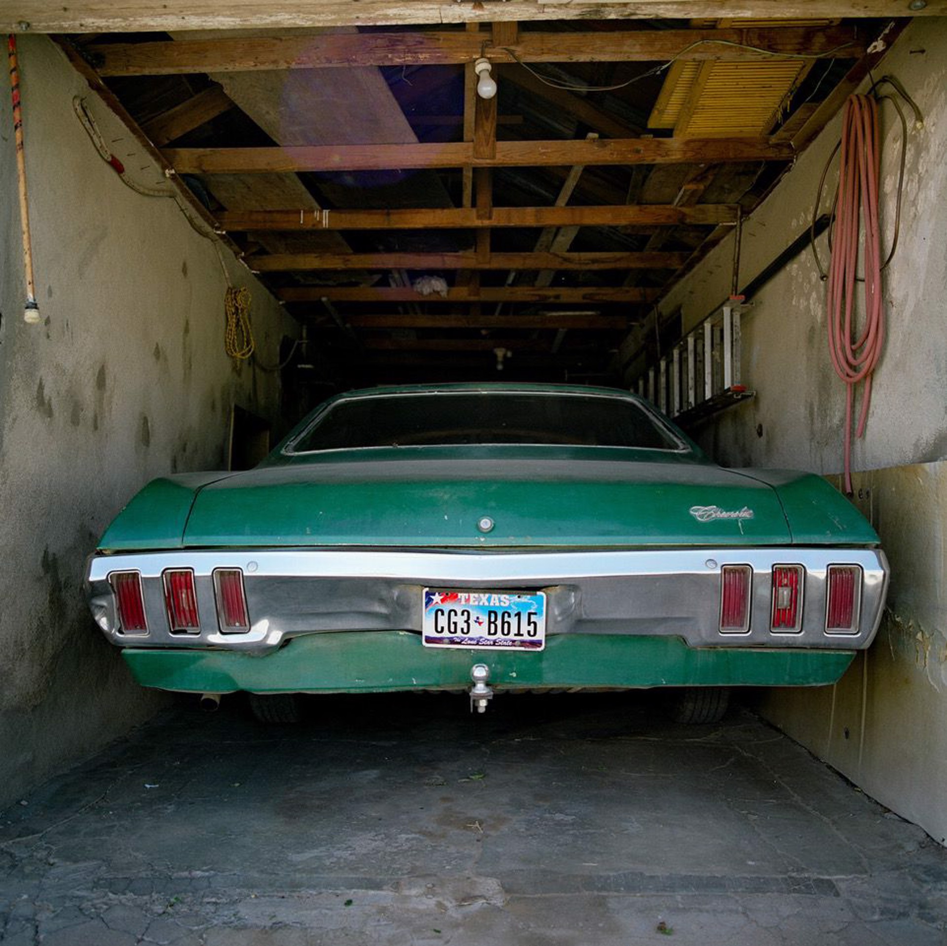 Green Car in Garage by Allison V. Smith
