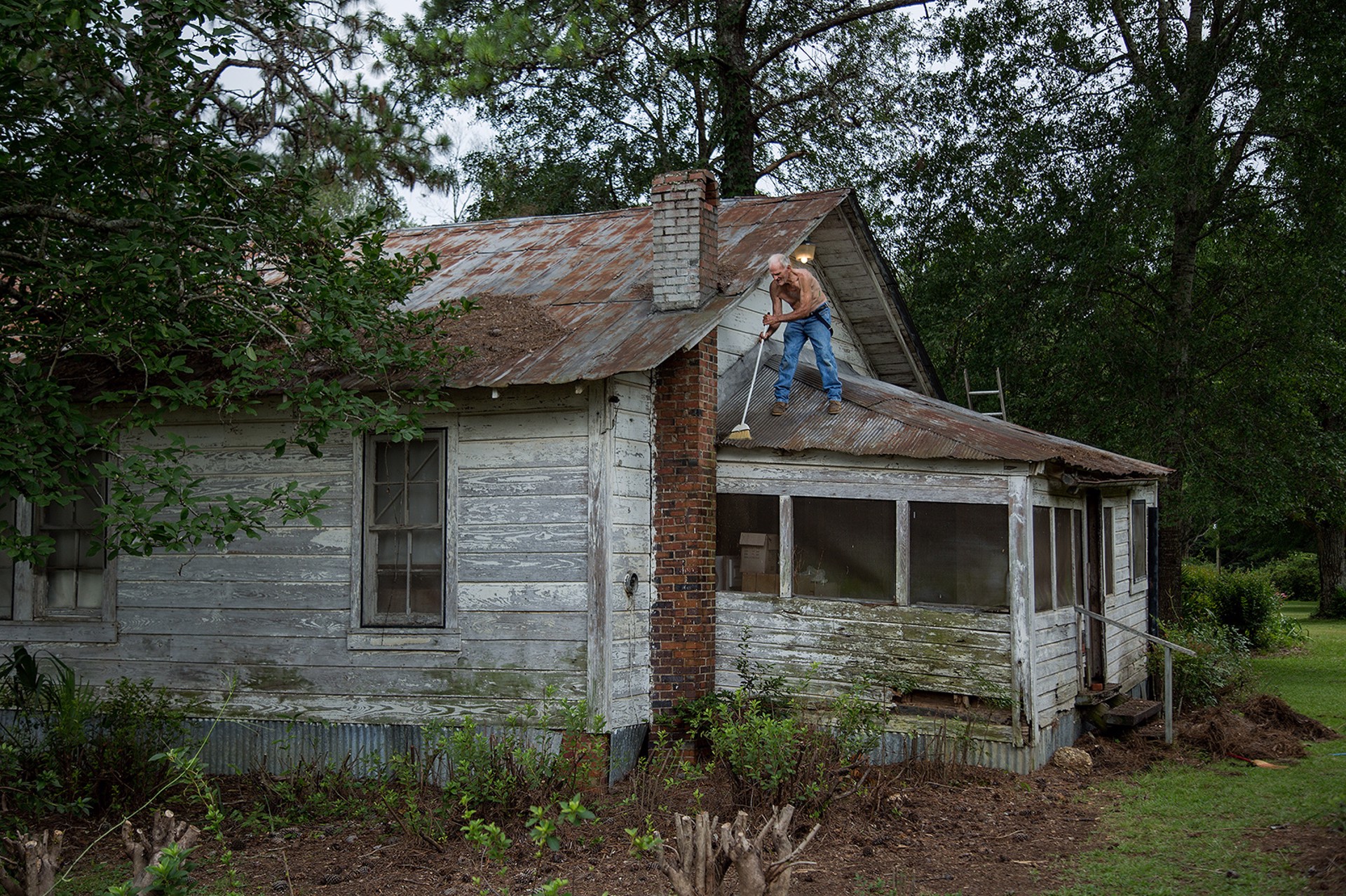 Sweeping the Roof, Dallas County, AL by Jerry Siegel