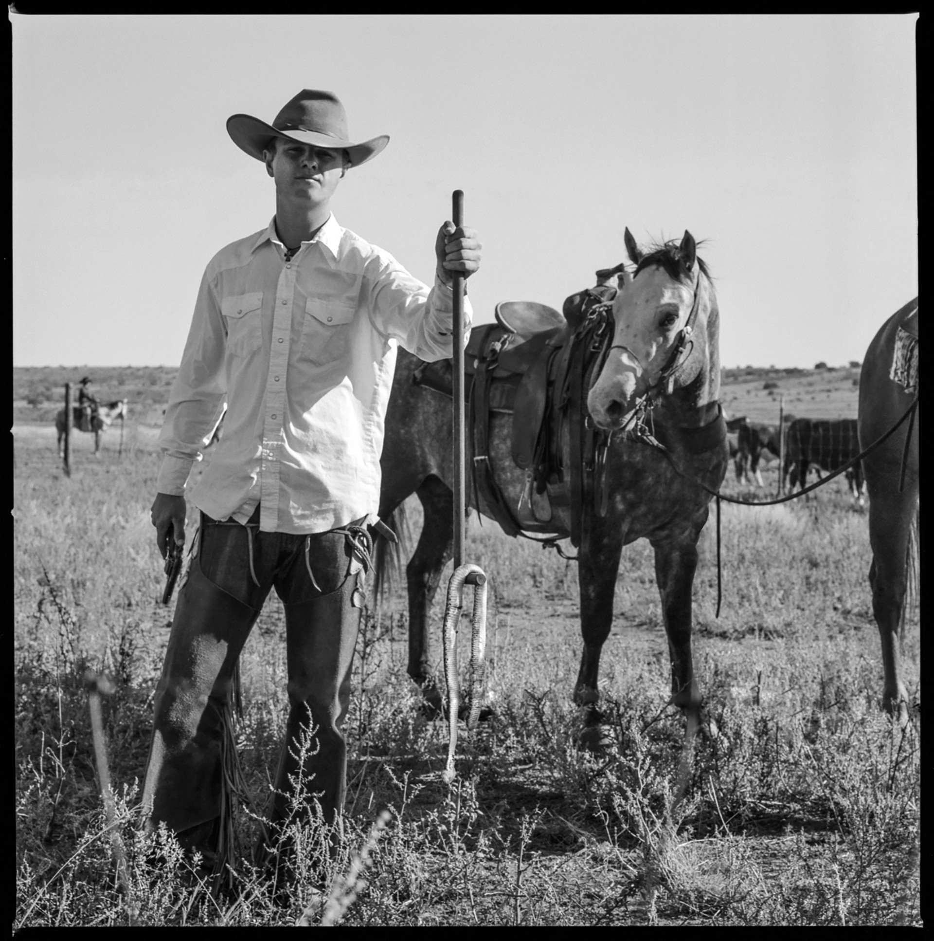 Cowboy with Rattlesnake - Ft. Davis, Texas by Kevin Greenblat