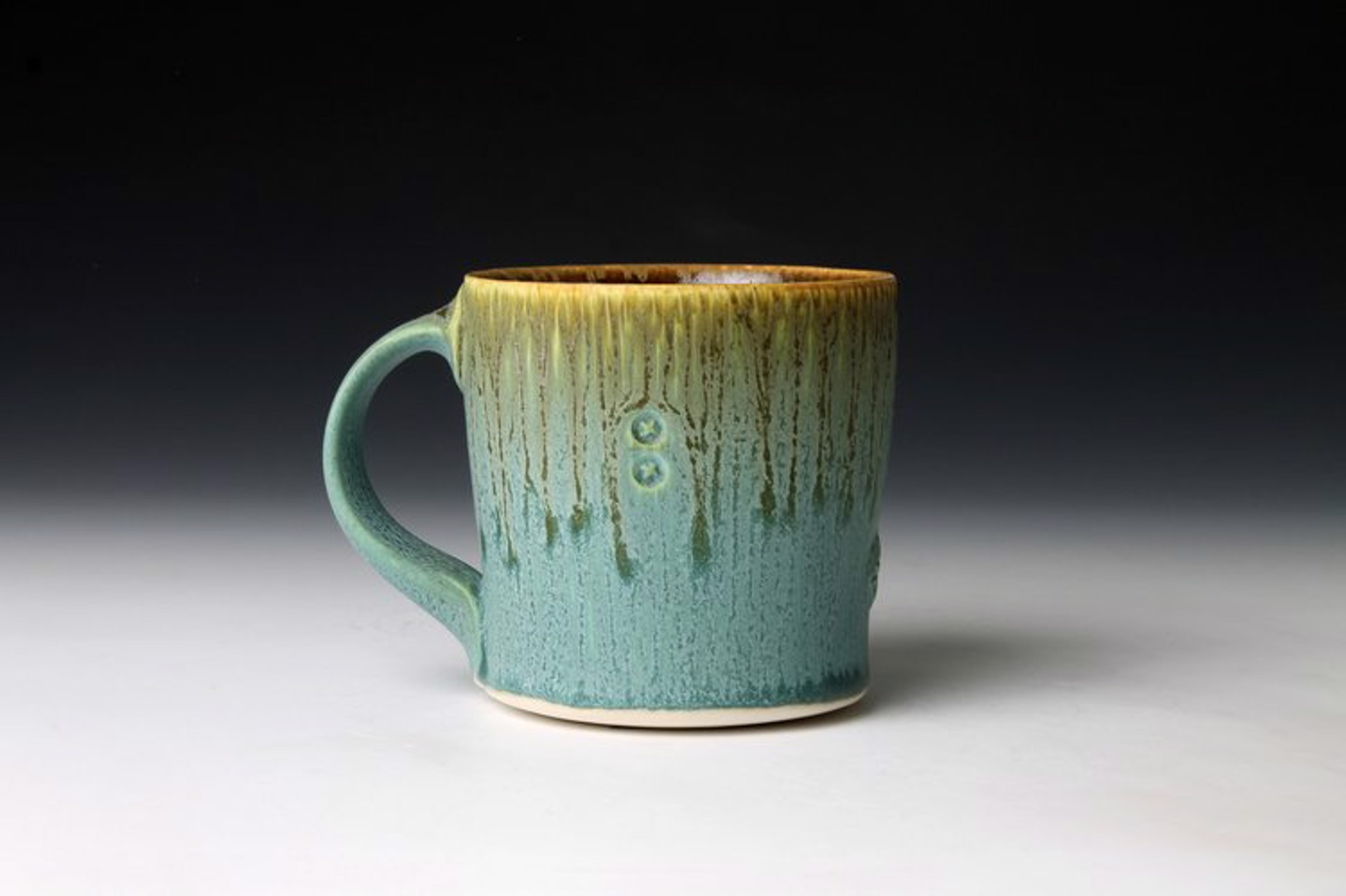 Round Turquoise Mug by Nick DeVries