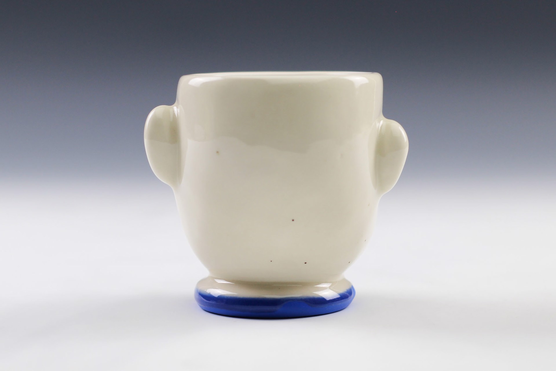 Doll Head Cup by Tom Bartel