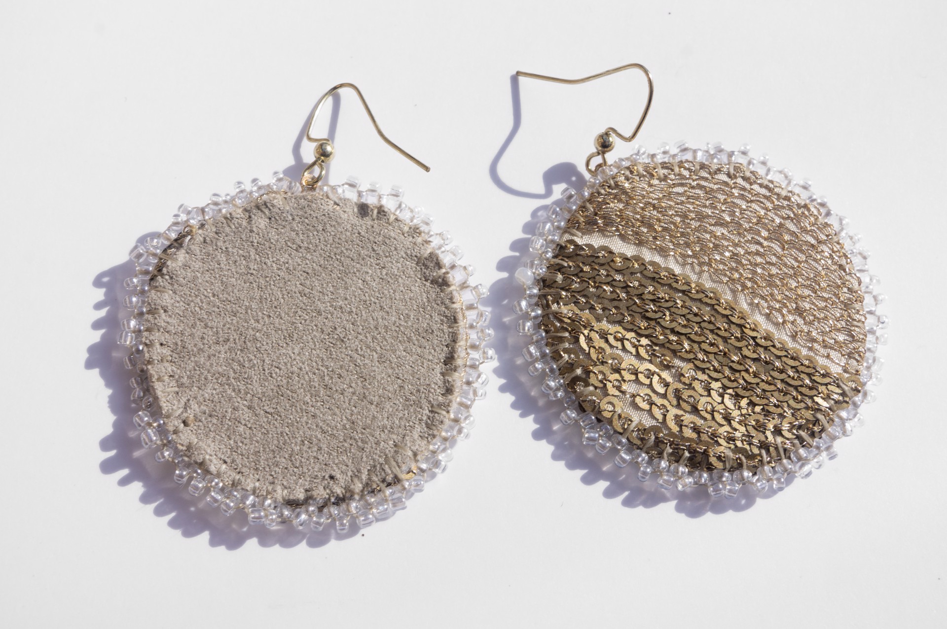 Sequin and embroidery earrings by Hattie Lee Mendoza