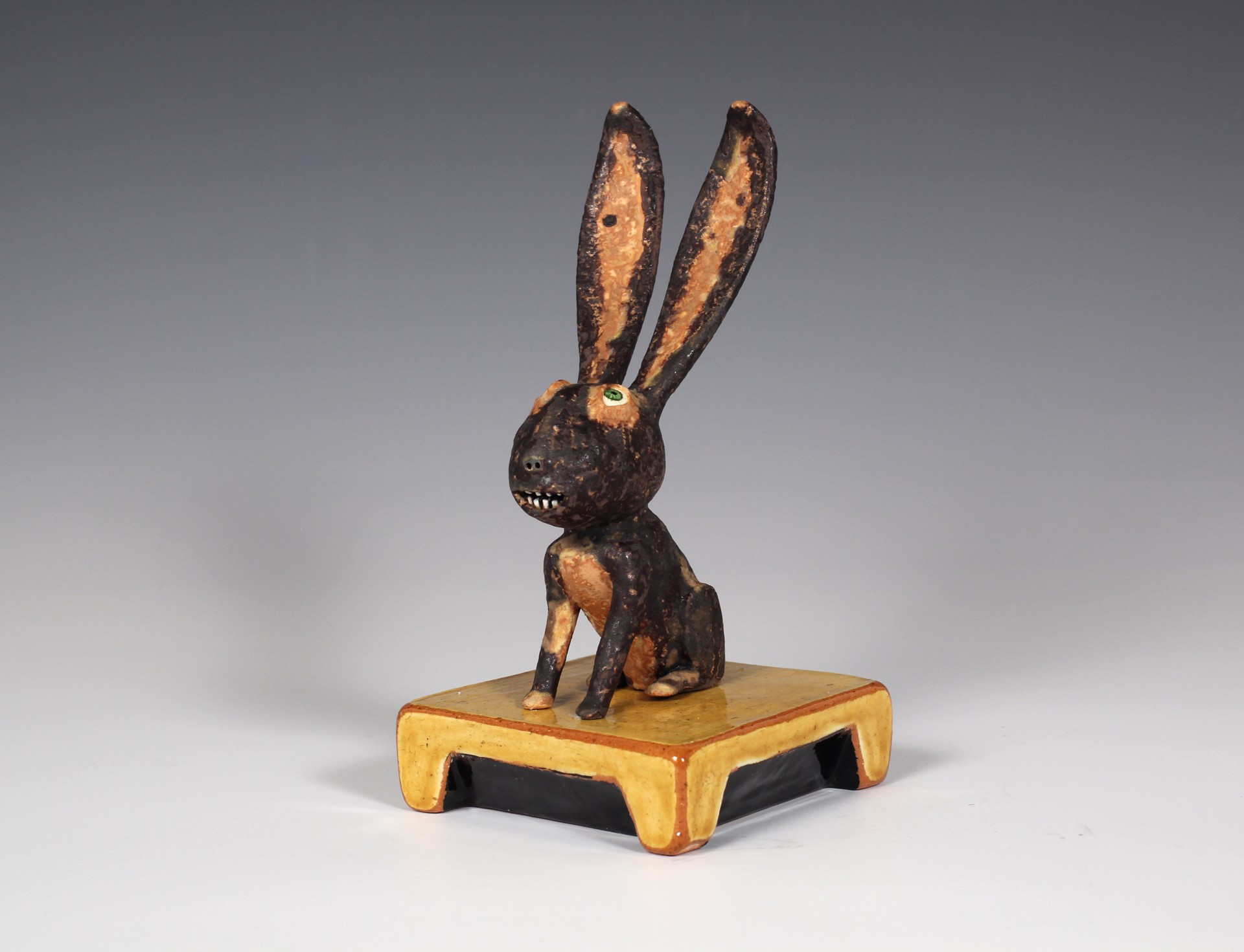 Black and Brown Rabbit with Yellow Base by Wesley Anderegg