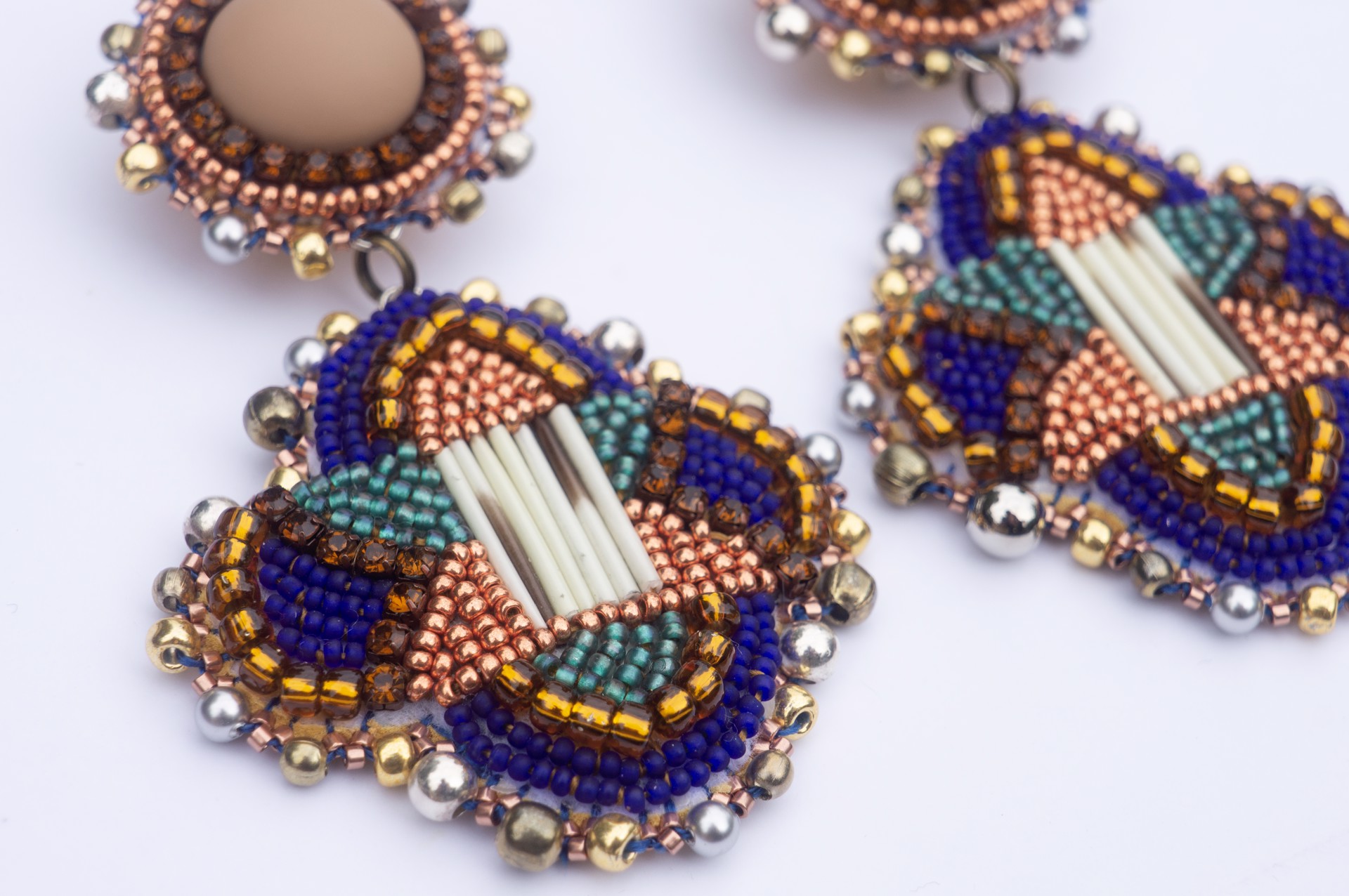 Quilled and beaded earrings by Hattie Lee Mendoza