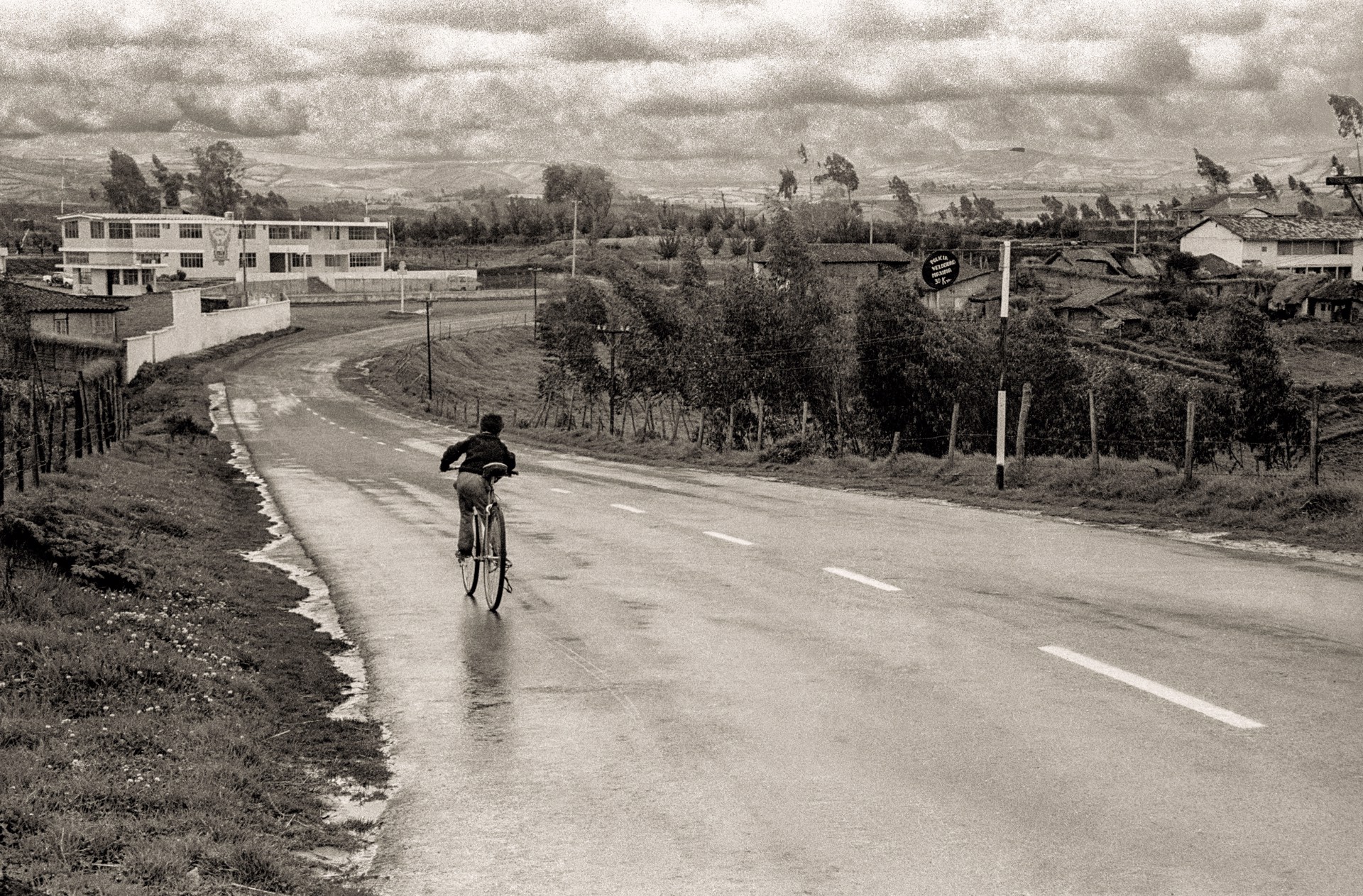 Bicycling Boy on Wet Road, Framed (043) by Jack Dempsey