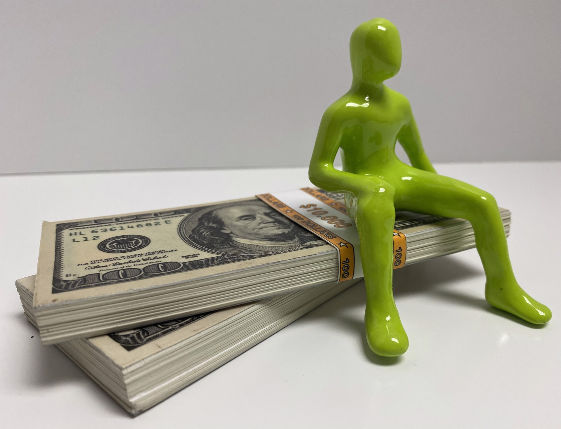 People With Money (lime figure) by Ancizar Marin