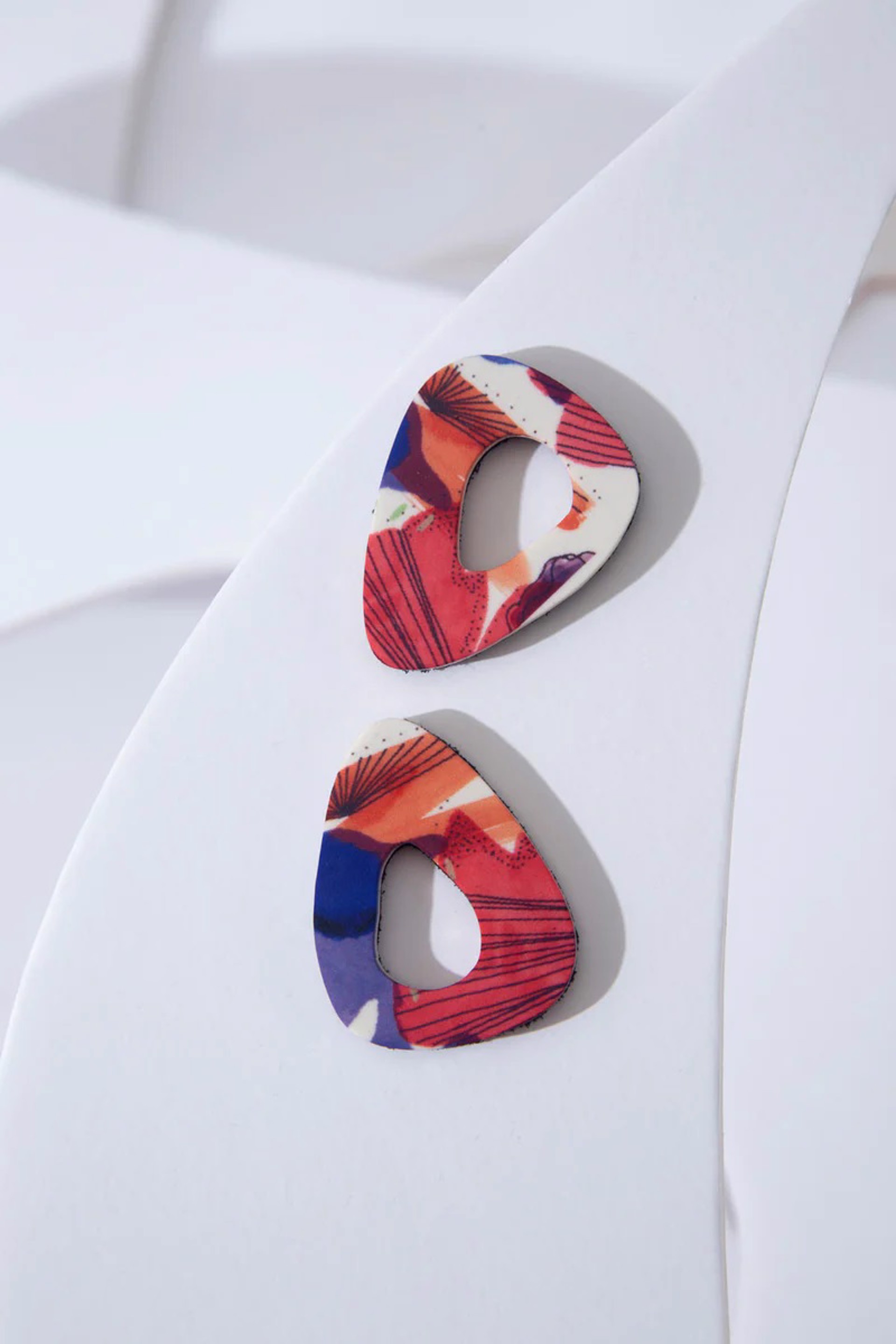 Prings Spring Triangle Earrings by ISKIN Nikaia Inc.