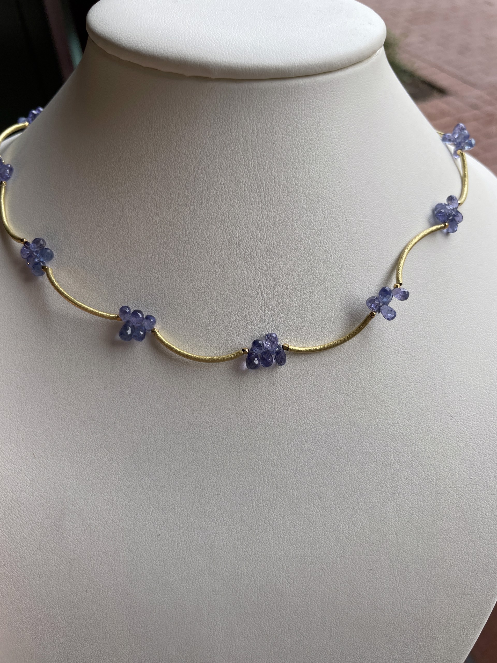 Dangerous Curves - 18k tubes Tanzanite briolettes 27.5 cts tw by Mara Labell