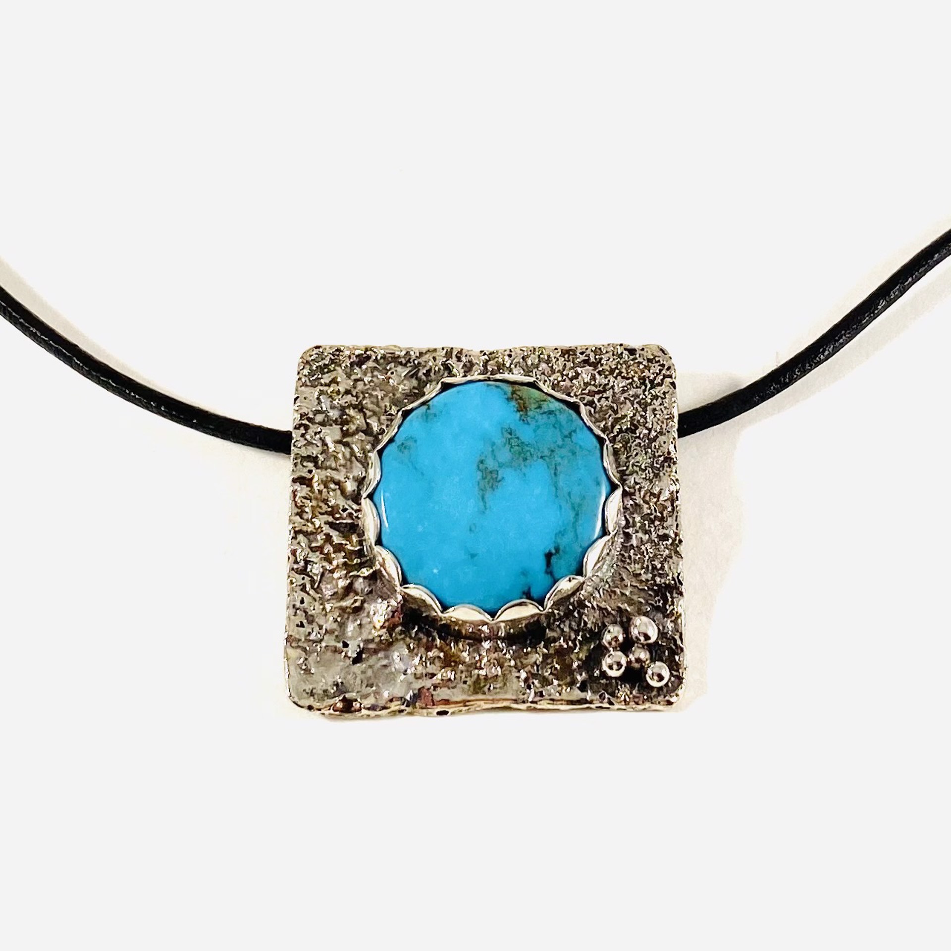 Kingman Turquoise Reticulated Silver Pendant on Leather Cord Necklace AB21-29 by Anne Bivens