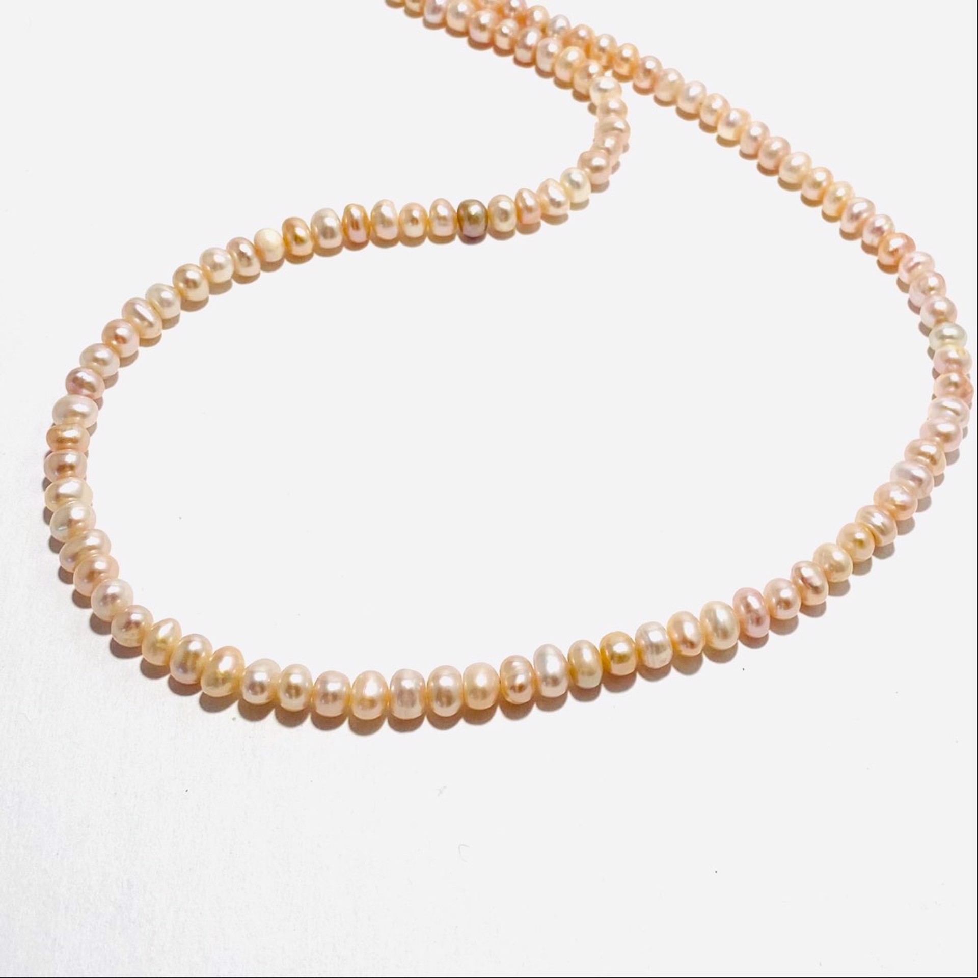 NT22-234  Peach Pearl Strand  Necklace by Nance Trueworthy