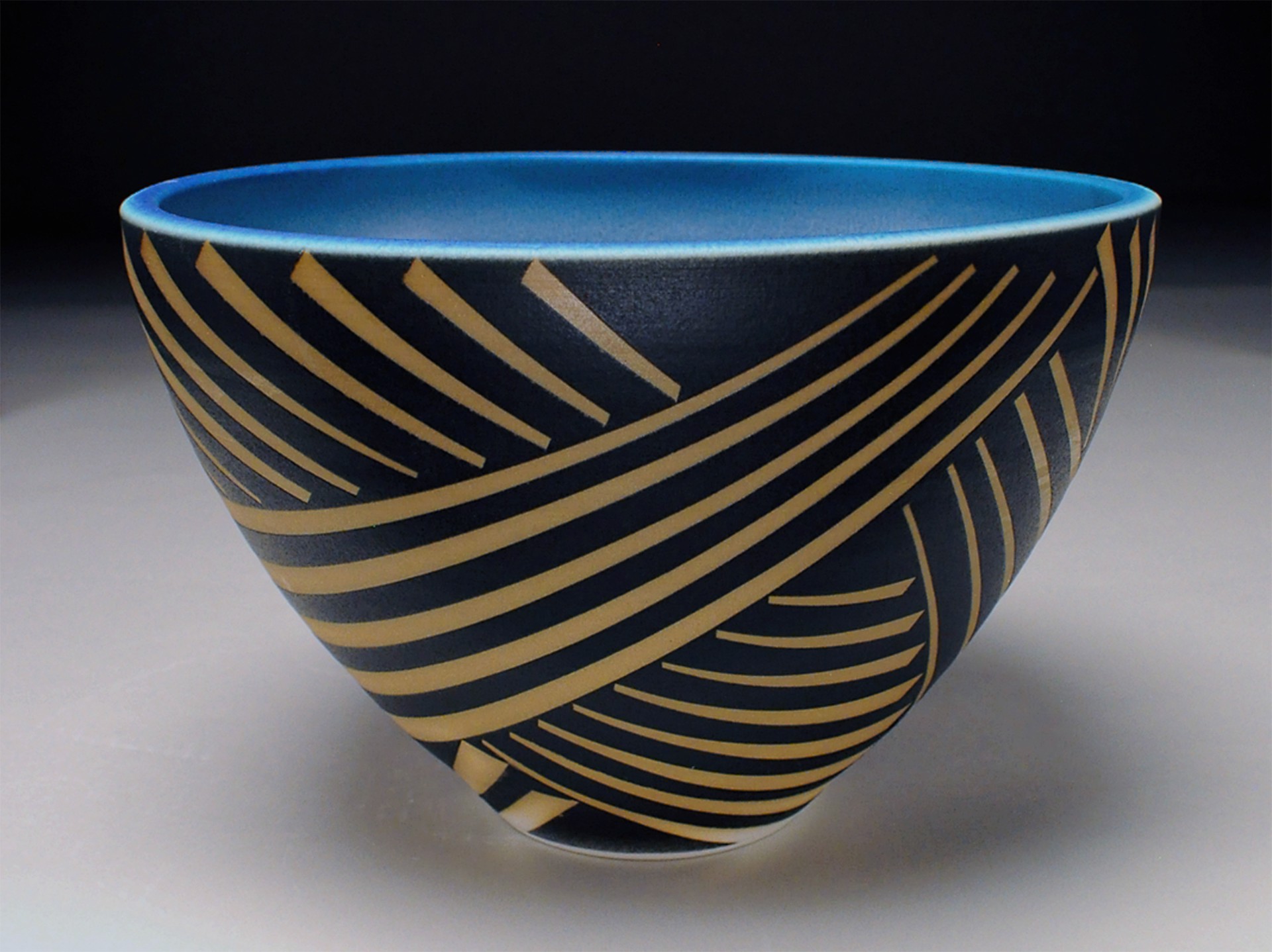 #147, Bowl, long wide triangles by N B