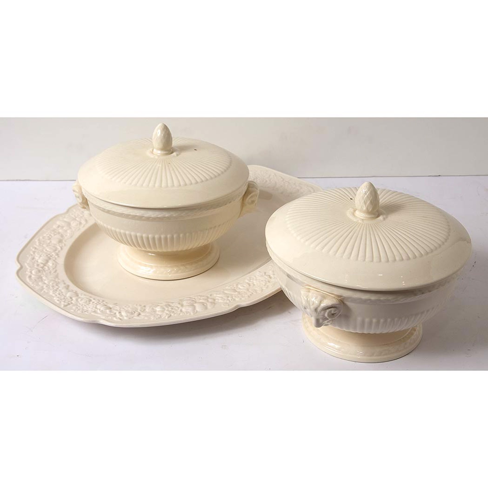 SET OF THREE WEDGWOOD CREAMWARE TUREENS; TOGETHER WITH TWO CROWN DUCAL PLATTERS
