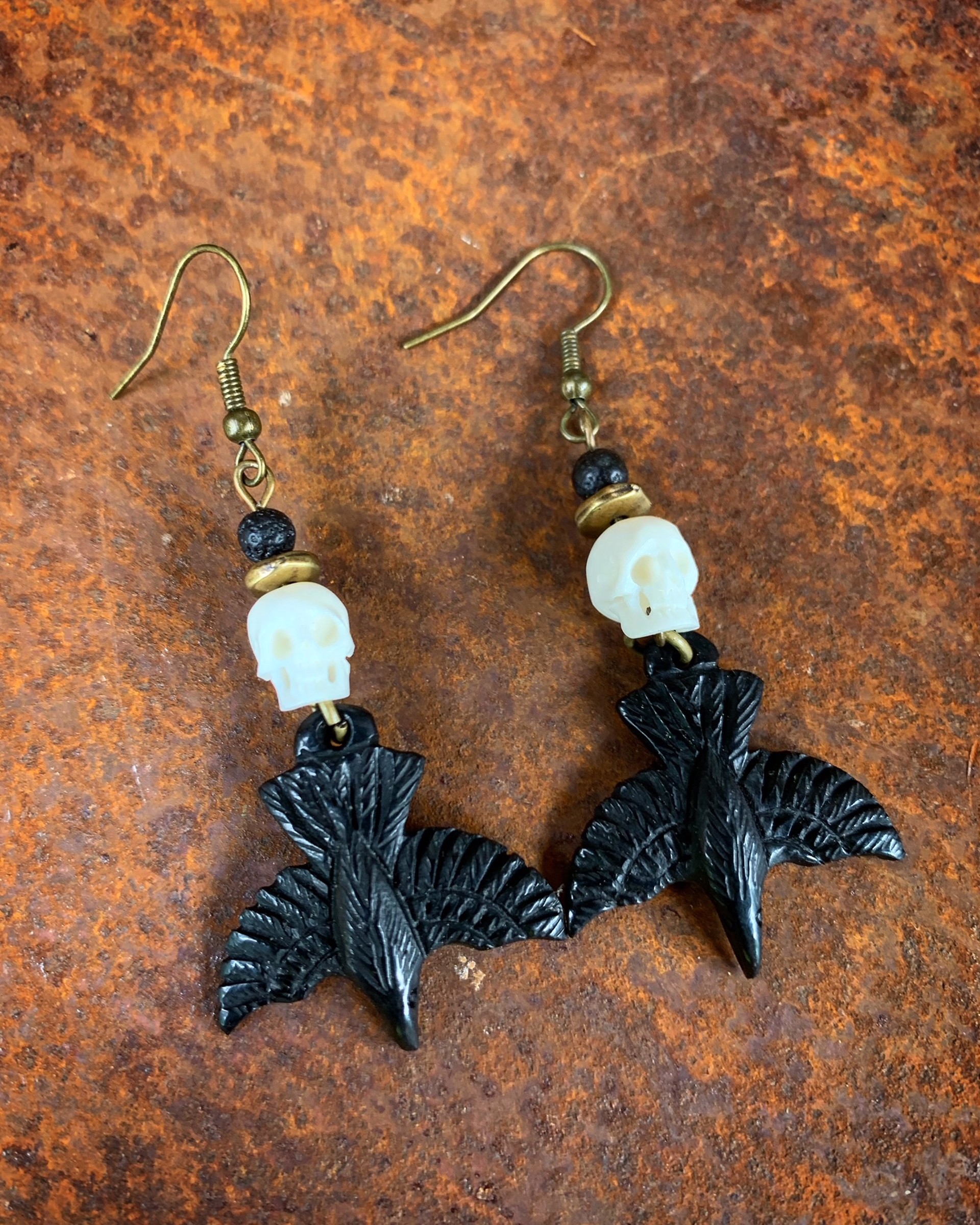 K838 Buffalo Horn Ravens with Carved Bone Skulls by Kelly Ormsby