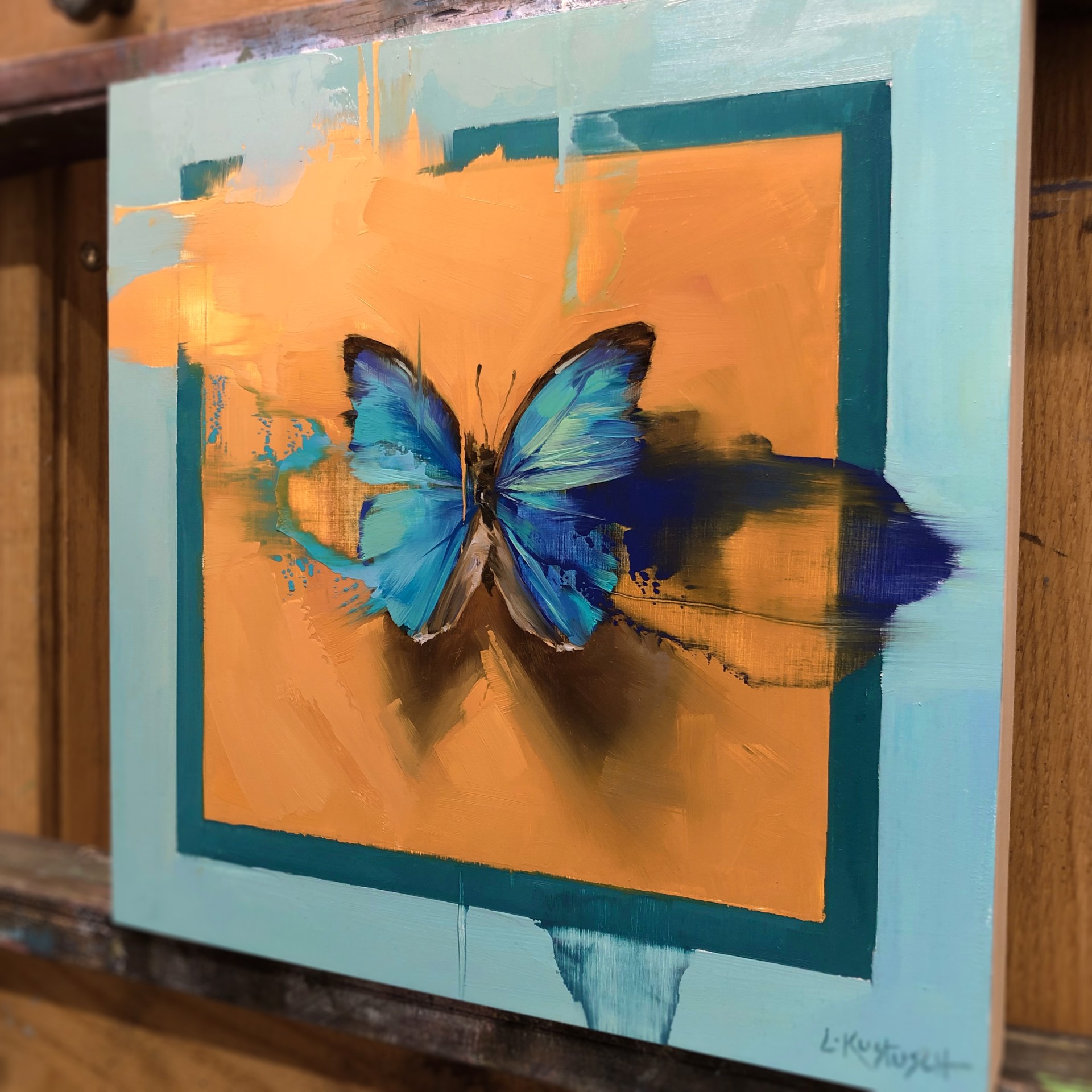 The Blue Morpho on Shades of Tangerine & Teal by Lindsey Kustusch