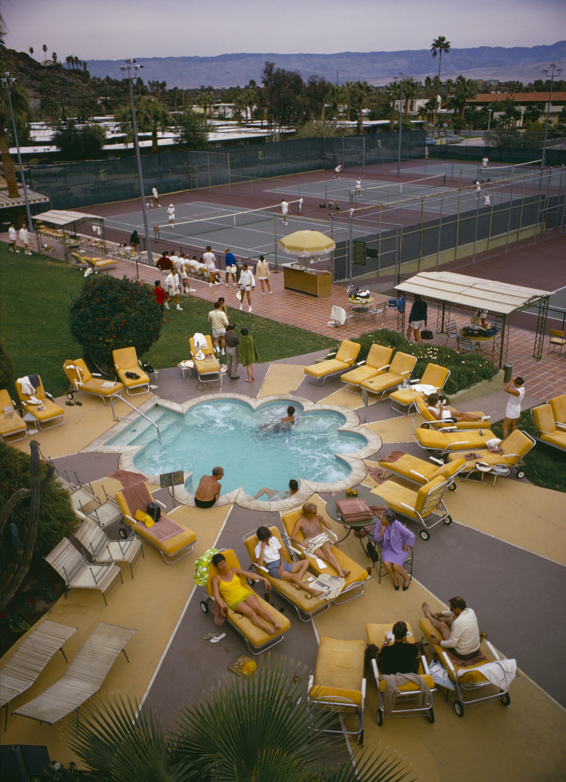 Relaxing At The Club by Slim Aarons