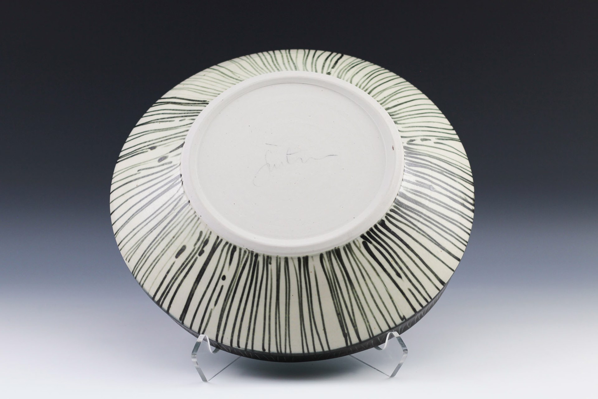 Large Black Rim Bowl by Delores Fortuna