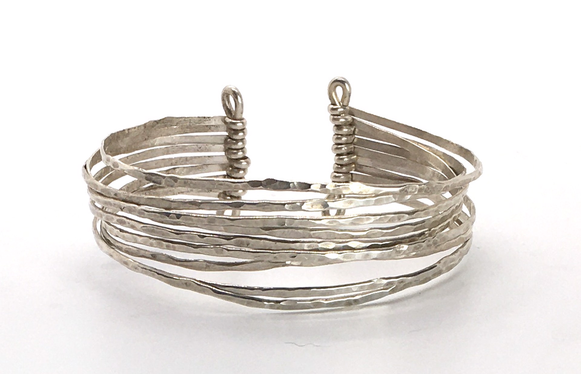 Bracelet - 9 Strand Hammered Sterling Silver Cuff by Suzanne Woodworth