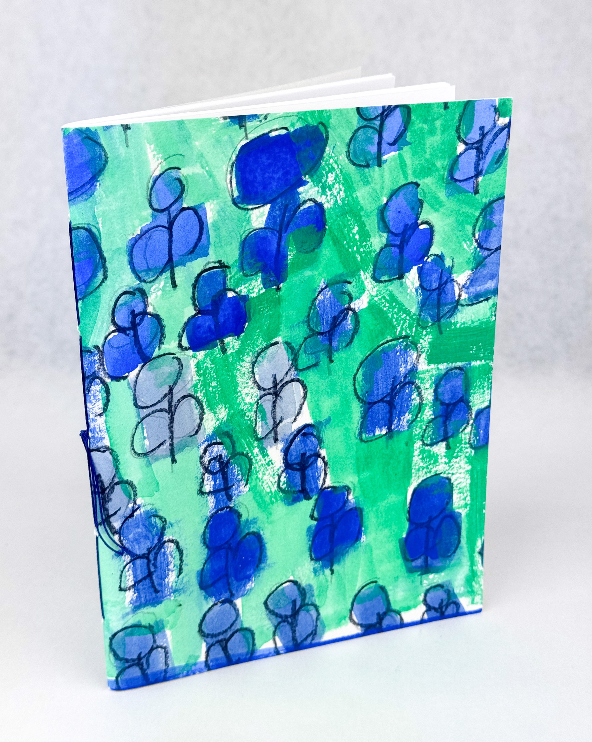 Blue Flowers Blooming (notebook) by Helen Lewis