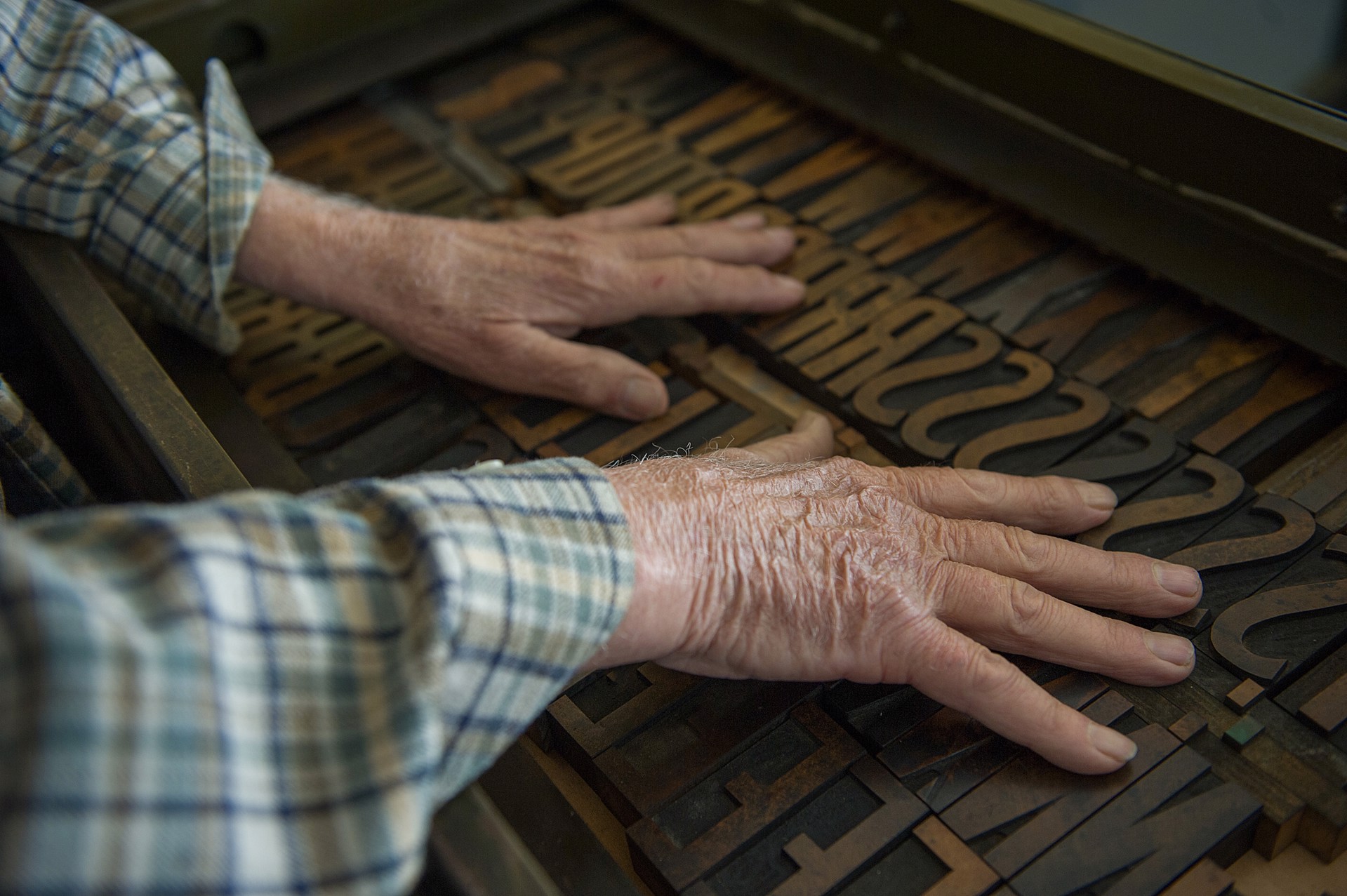 Hands of Glenn House Sr., artist and designer, Gordo, Pickens County by Robin McDonald