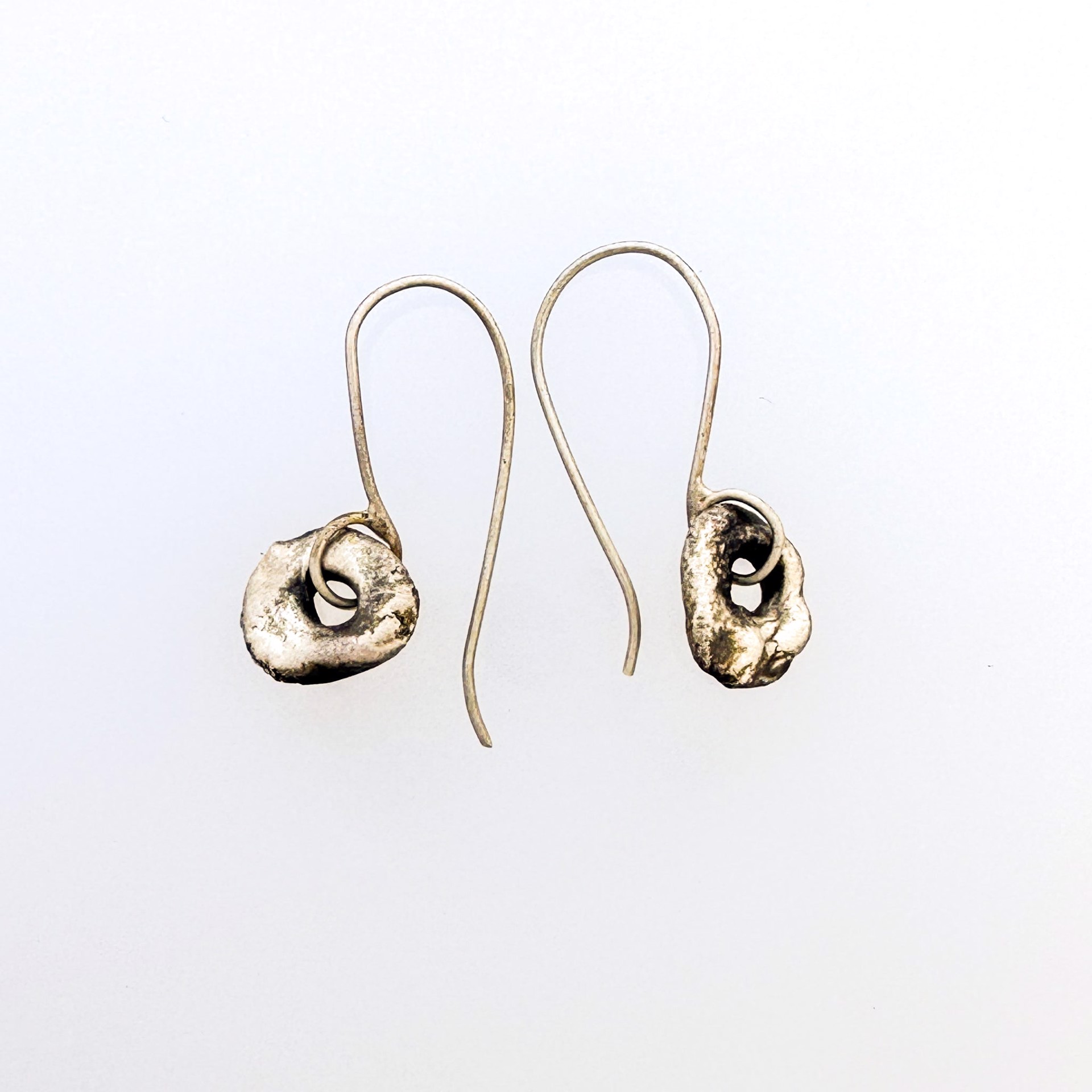 Molten earrings on hooks by Lori Metals