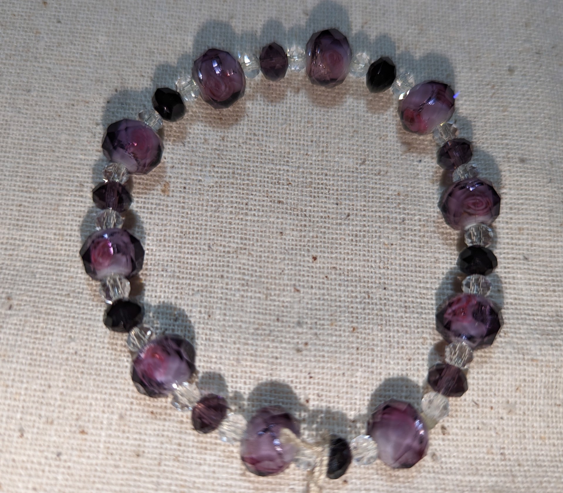 Purple & black bead bracelet by Betty Binder