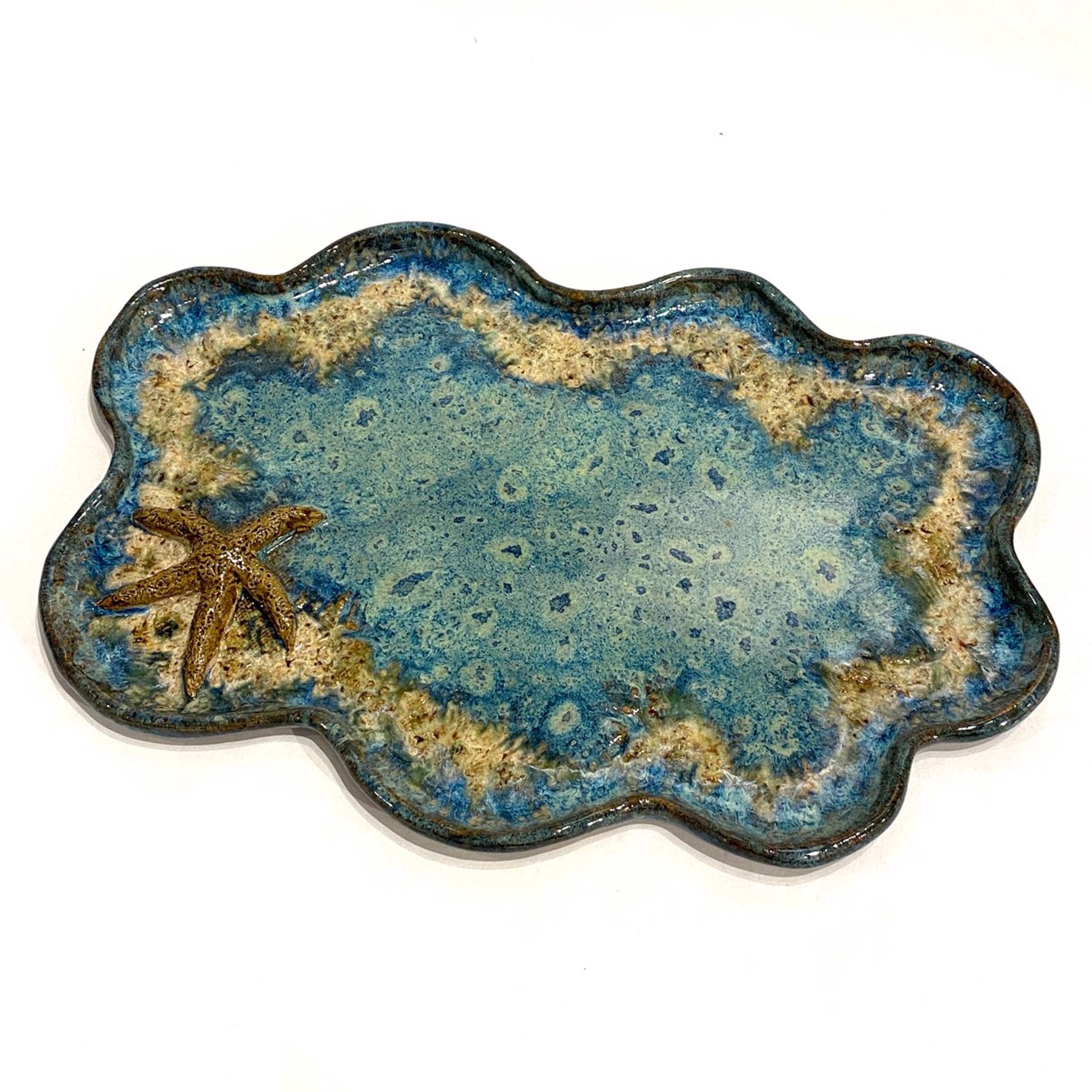LG23-1004 Plate with Starfish (Blue Glaze) by Jim & Steffi Logan