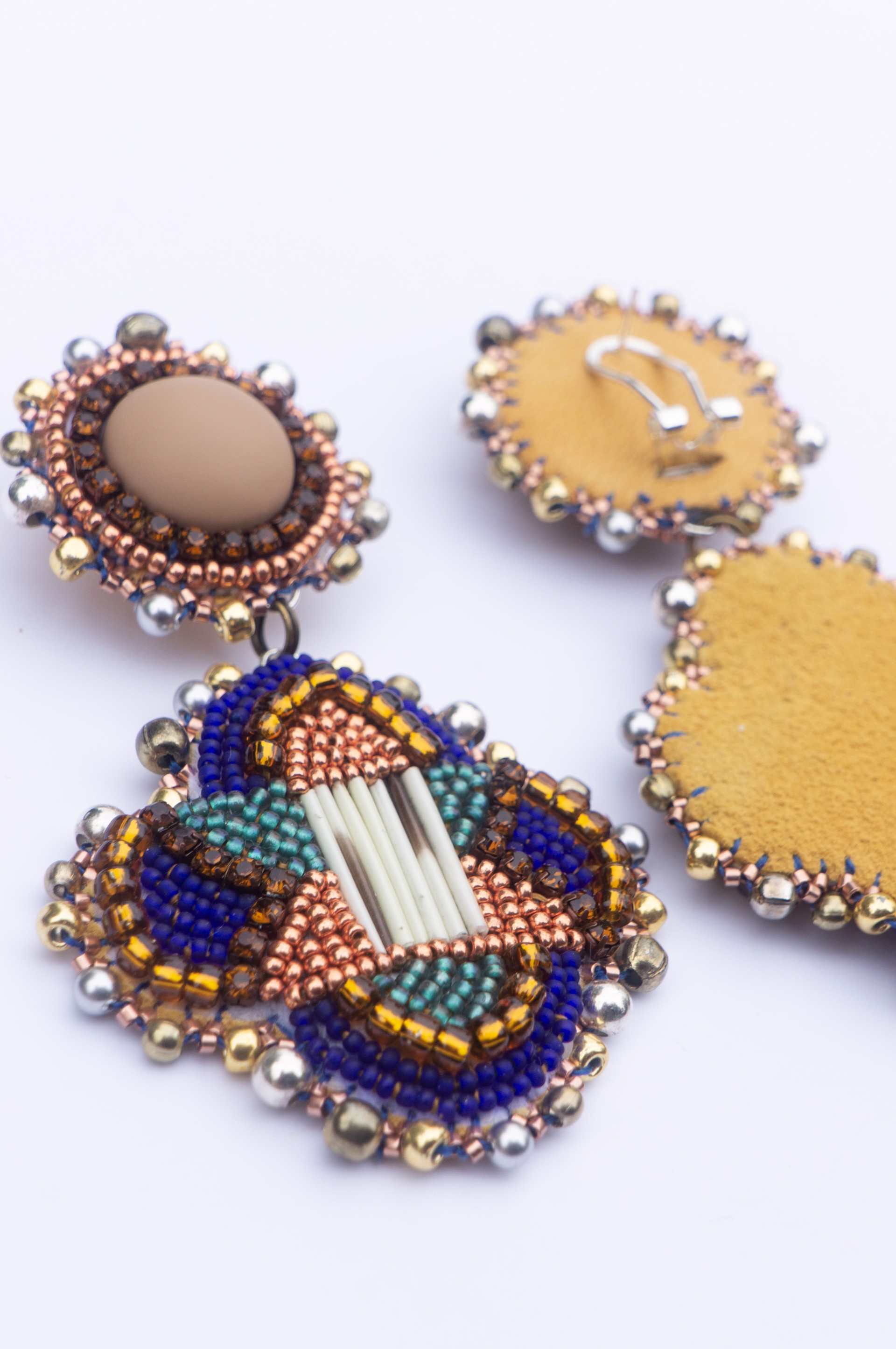 Quilled and beaded earrings by Hattie Lee Mendoza