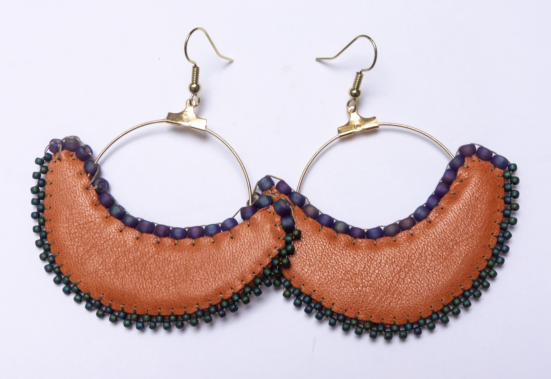 Leather and beaded hoops by Hattie Lee