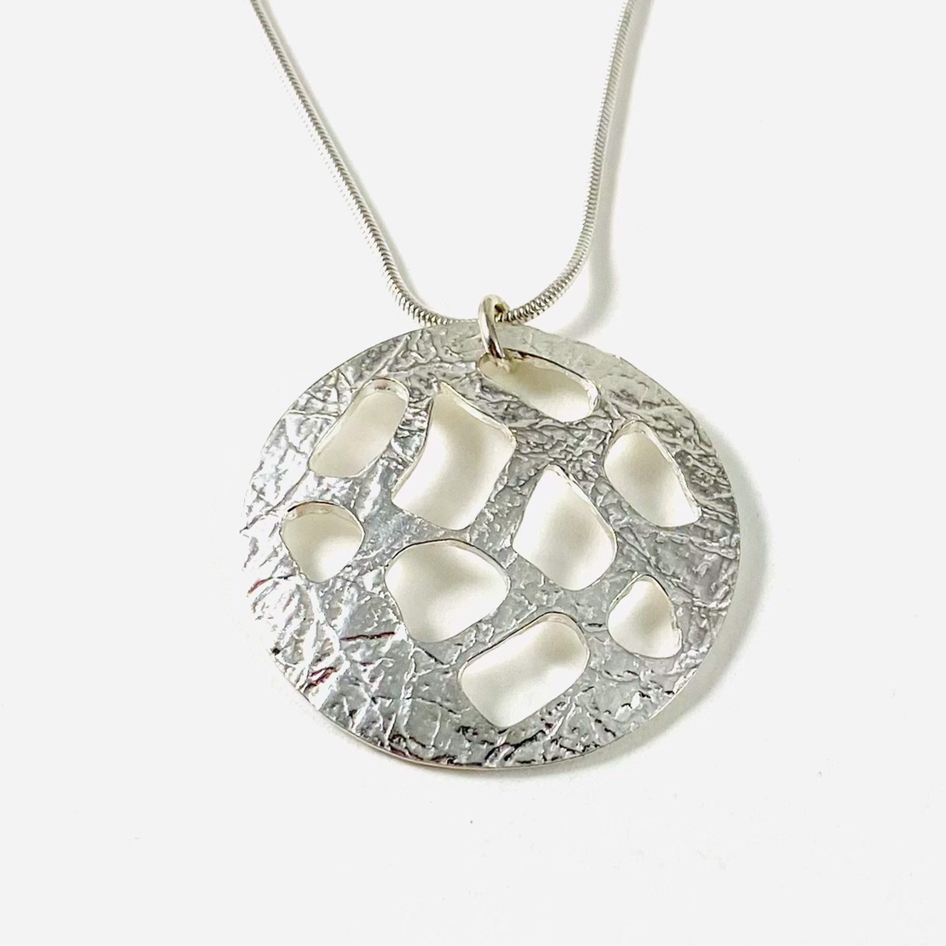 KH21-40 Circle with Cutouts Pendant 18" Sterling Snake Chain by Karen Hakim