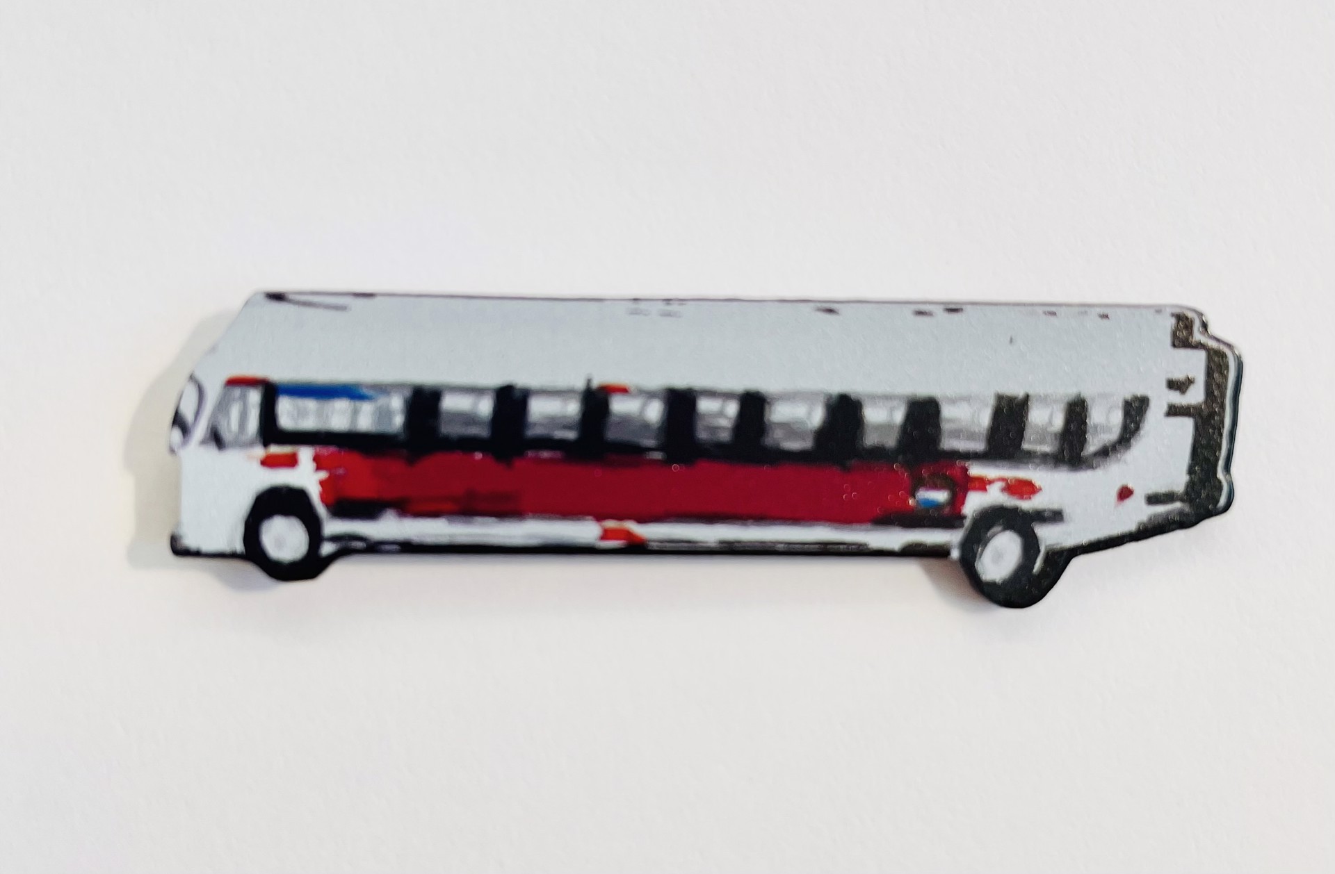 Enamel Pin - White Bus (artwork by Michael Haynes) 2" x 1/2" by Art Enables Merchandise