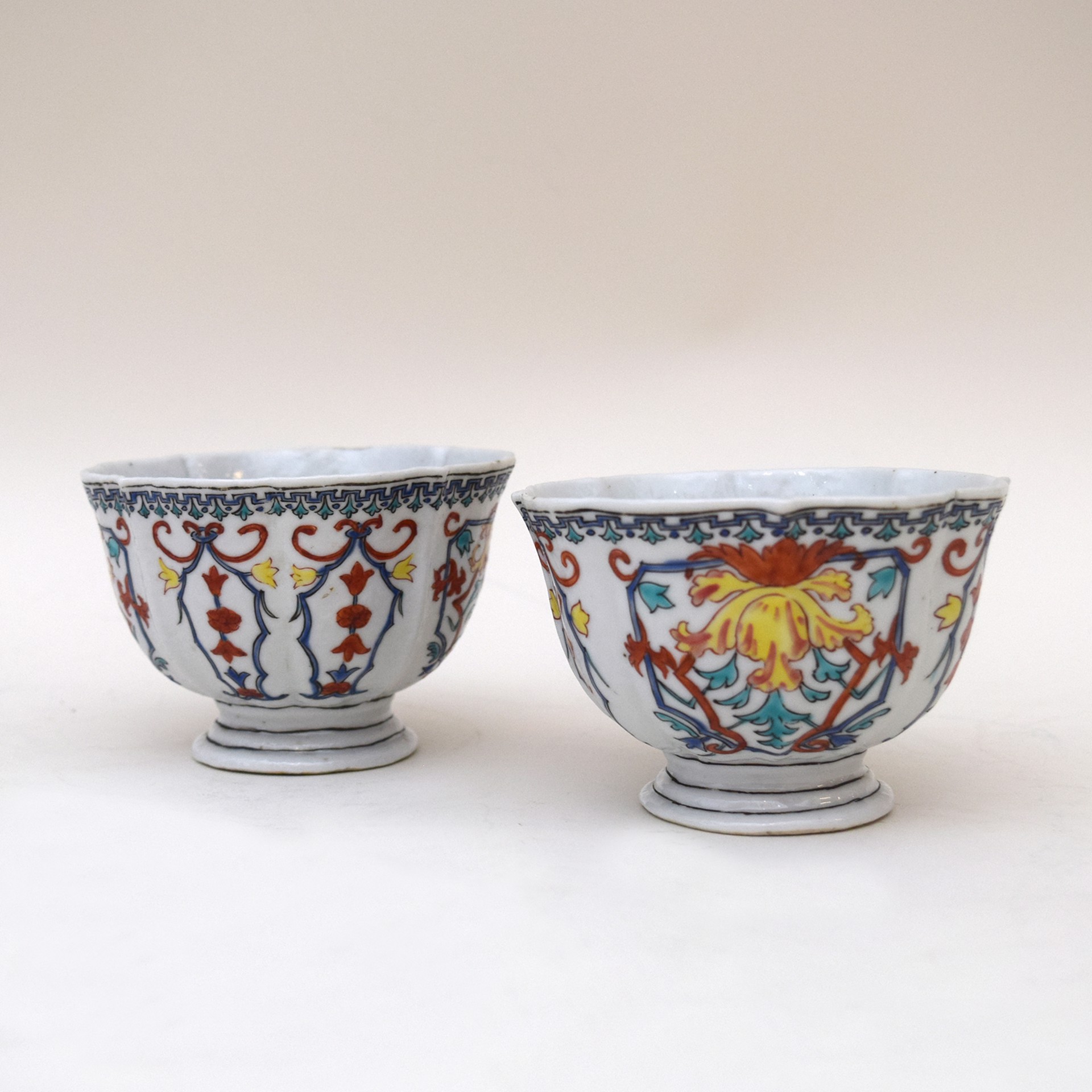 PAIR OF POLYCHROME FOOTED BOWLS AFTER VEZZI