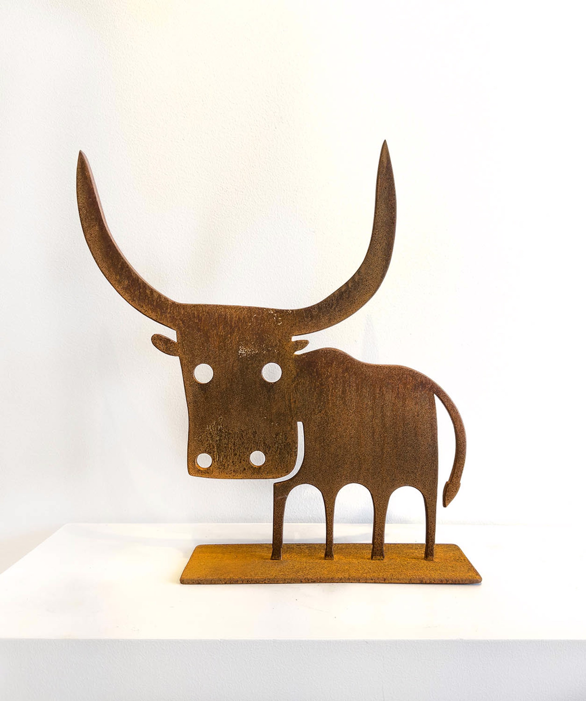 Steel Sculpture By Jeffie Brewer Of A Standing Bull With Rusty Finish