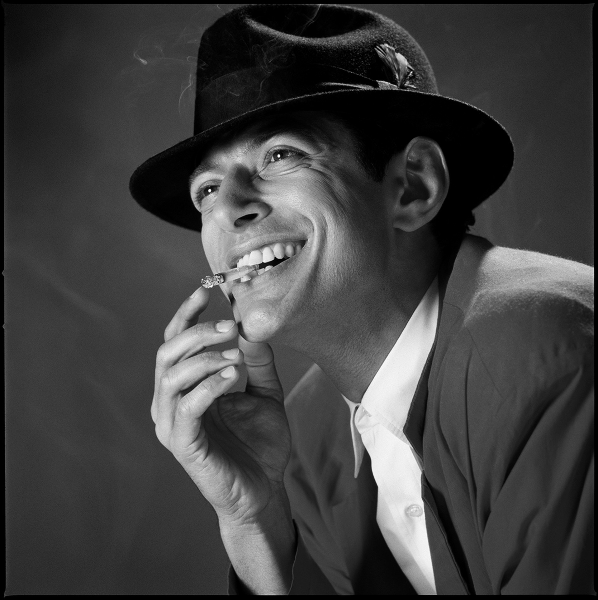 88007 Jeff Goldblum Smiling With Cigarette In Mouth BW by Timothy White