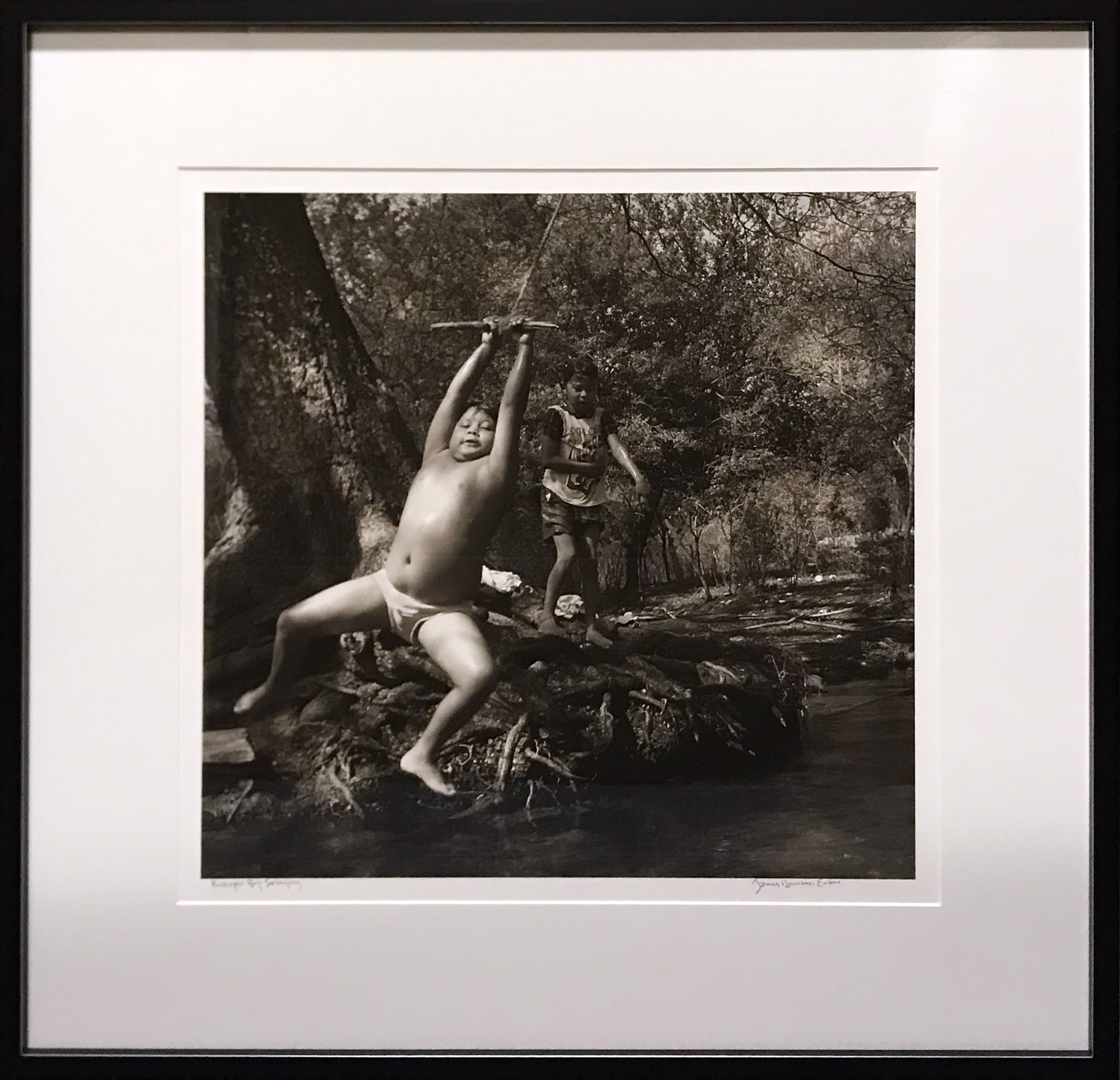 Kickapoo Boy Swinging, Nacimiento, Mexico by James H. Evans
