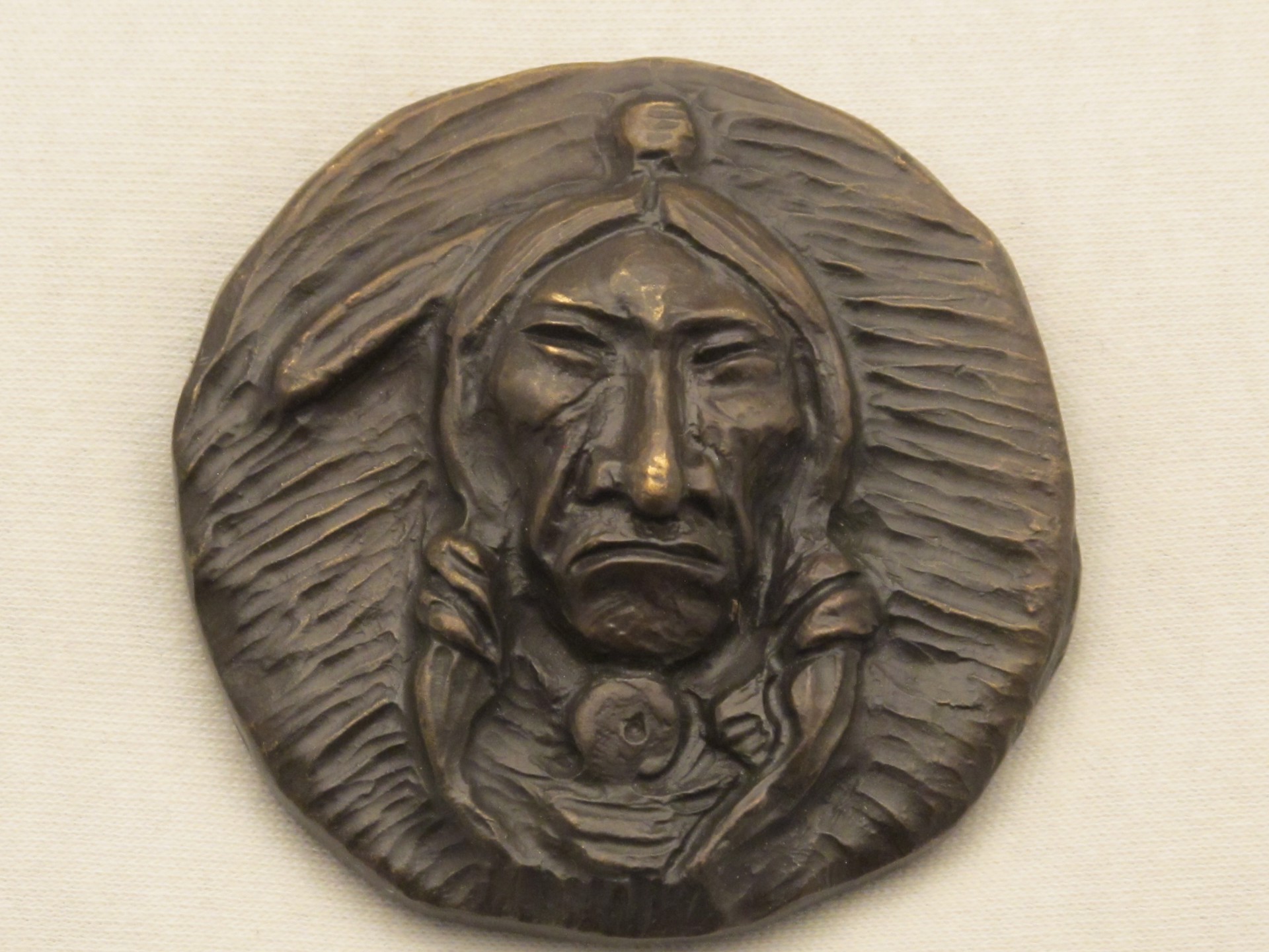 Plains Indian Medallion  by Allan Houser