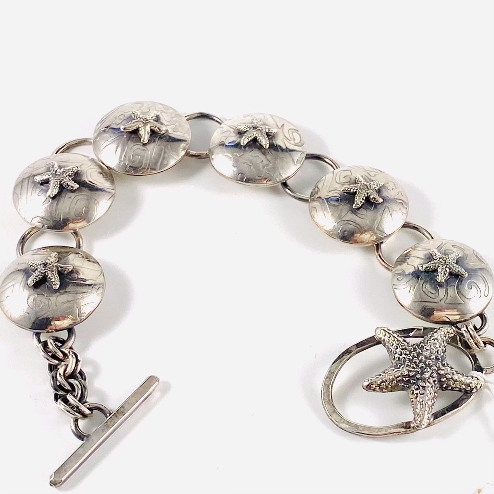 Six Disc with Starfish Accent and Large Starfish on Clasp, Link Bracelet AB22-77 by Anne Bivens