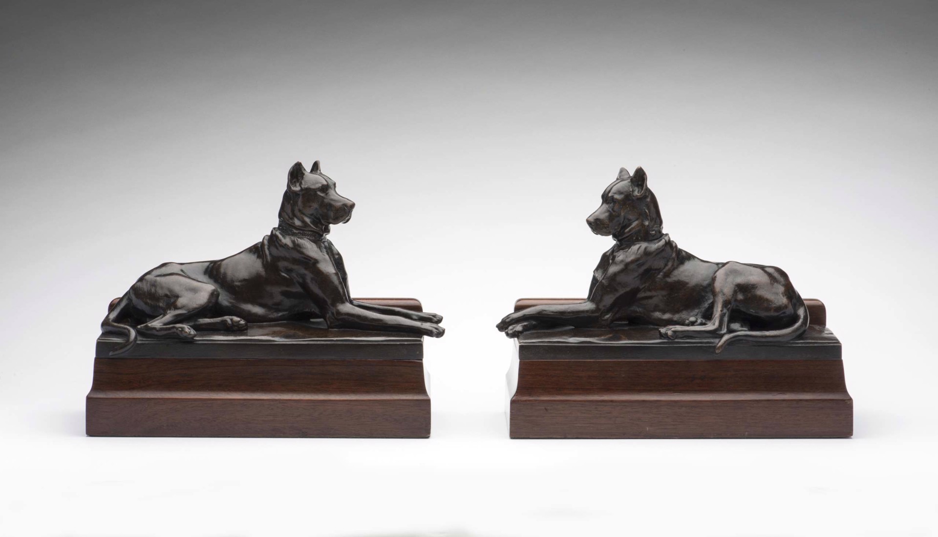 Reclining Great Danes; a pair by Georges Gardet