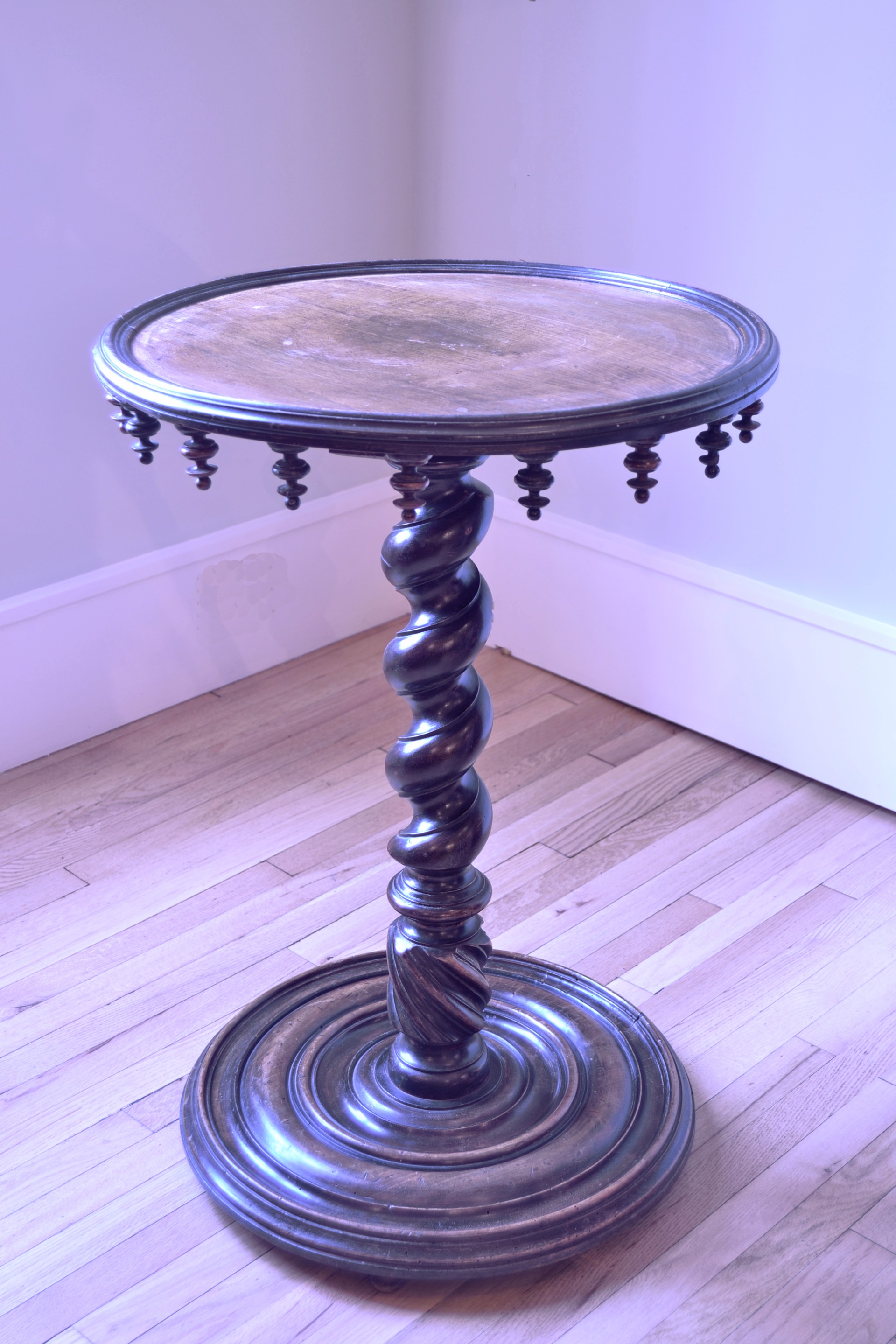 A VICTORIAN WALNUT AND PART EBONIZED SIDE TABLE