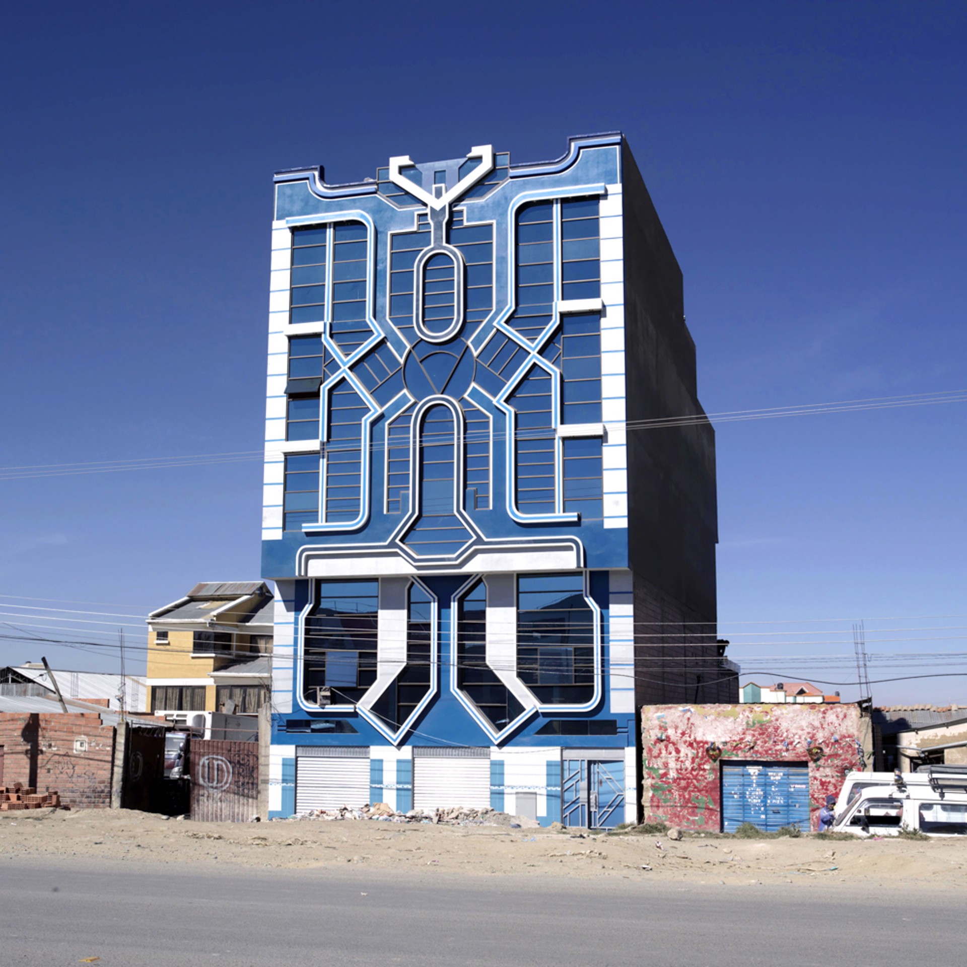 Big Blue Cholet, Andean Architecture, El Alto, La Paz, Bolivia. by Ana Nance