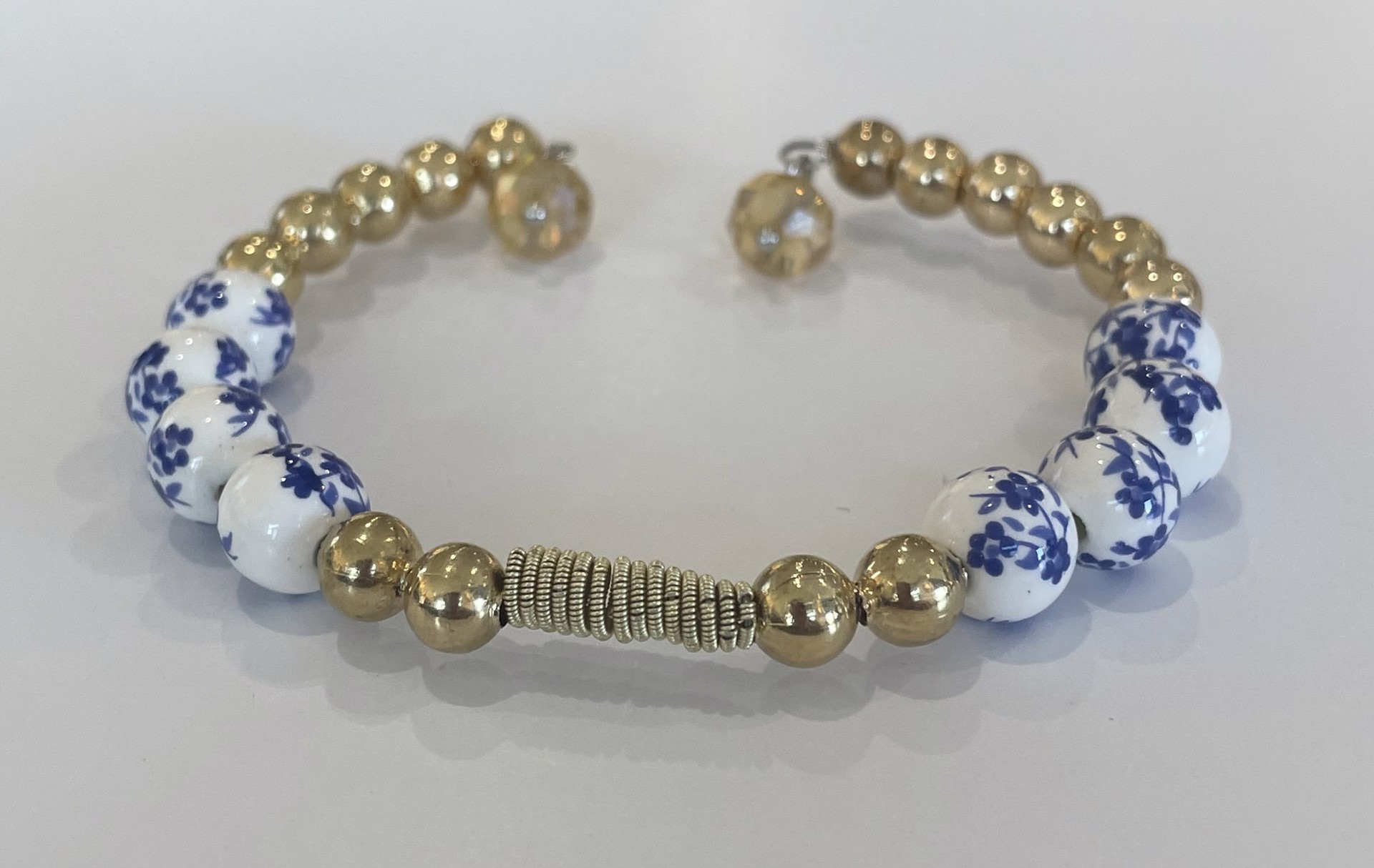 Blue and White Floral with Guitar String Bracelet by String Thing Designs