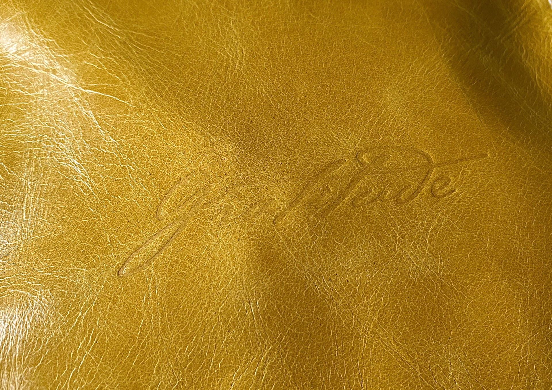 Small yellow leather wristlet handbag by Feel Handmade