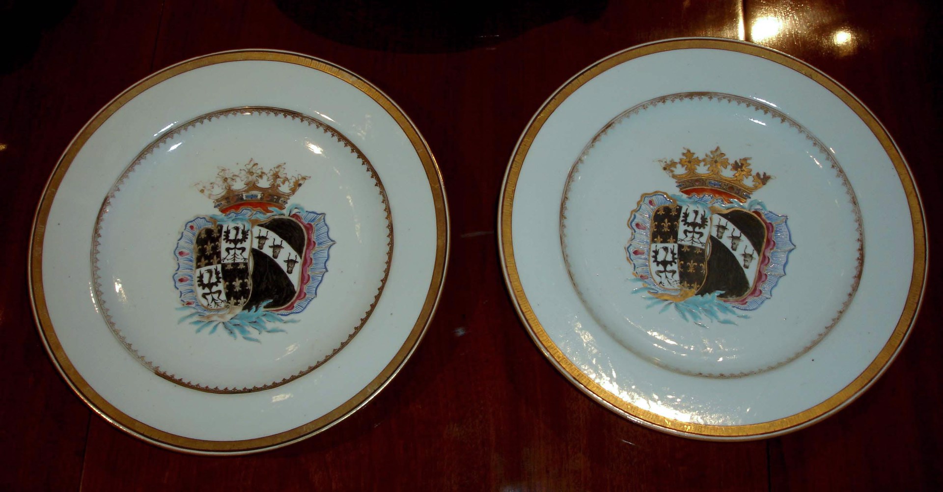 FOUR ARMORIAL DISHES WITH ARMS OF DE FAMARS AND VRIESEN