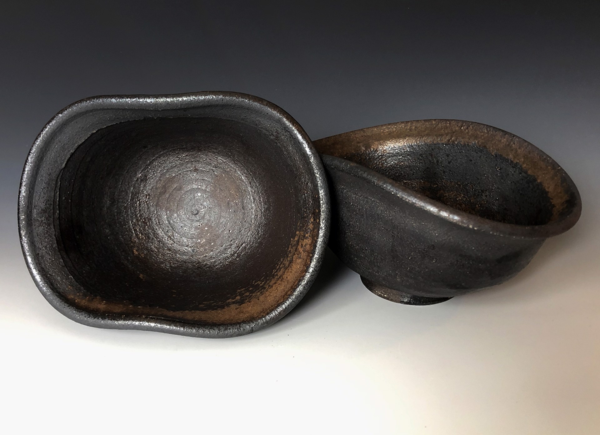 Black Cowboy Bowl (left in image) by Dom Venzant