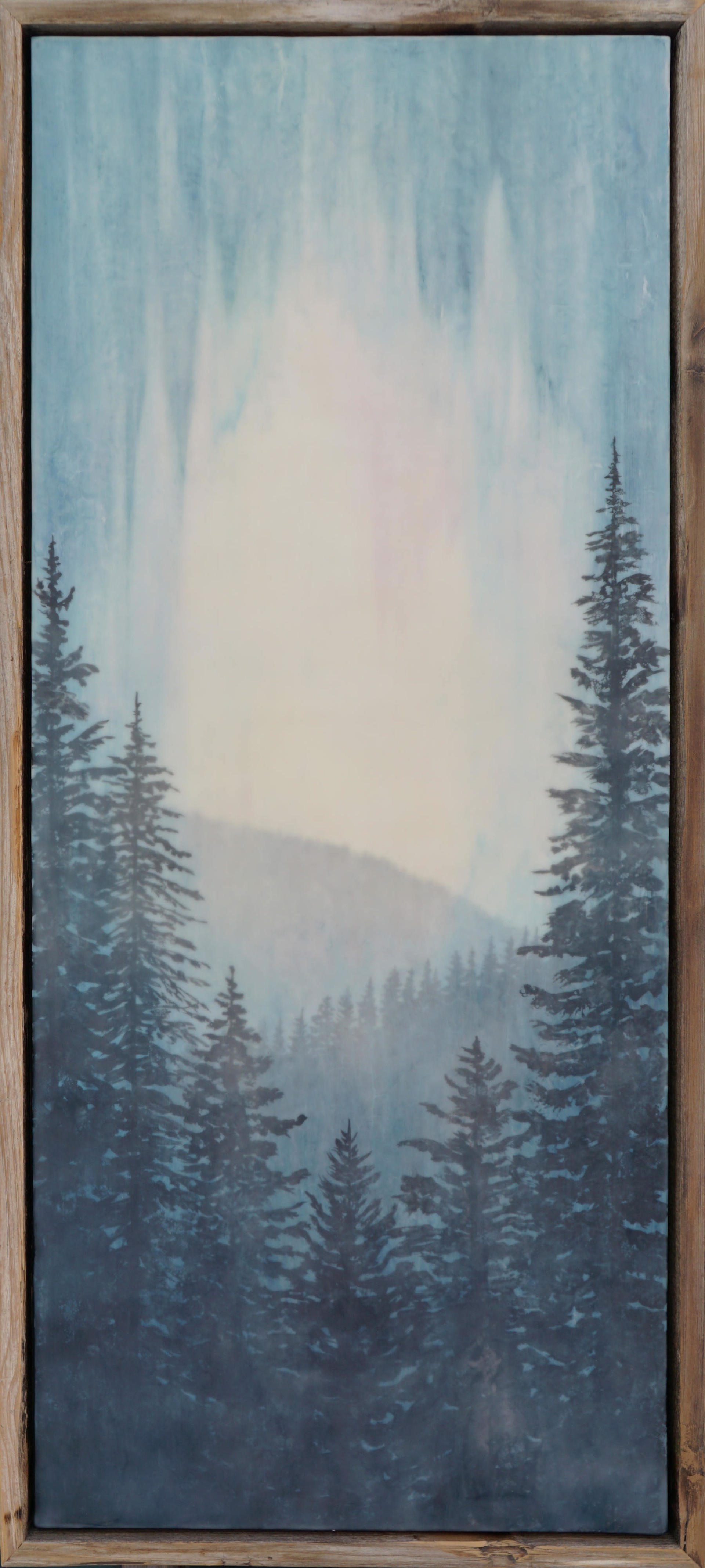 An Original Encaustic And Milk Paint Painting Of A Misty Treed Landscape With Blue Sky, Distant Hills And Layered Depth Of Trees, By Bridgette Meinhold