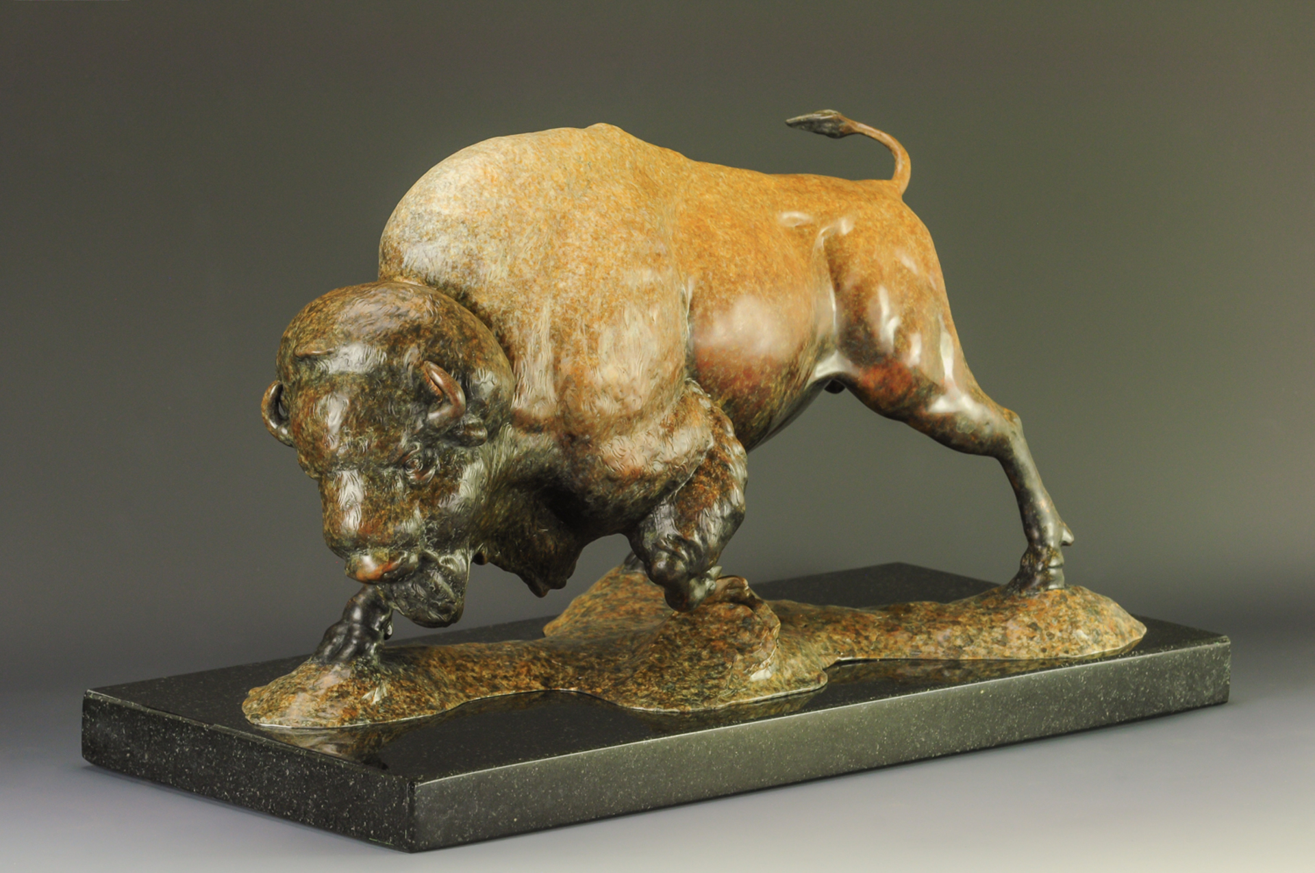 A Fine Art Sculpture In Bronze By Jeremy Bradshaw Featuring A Charging Bison, Available At Gallery Wild