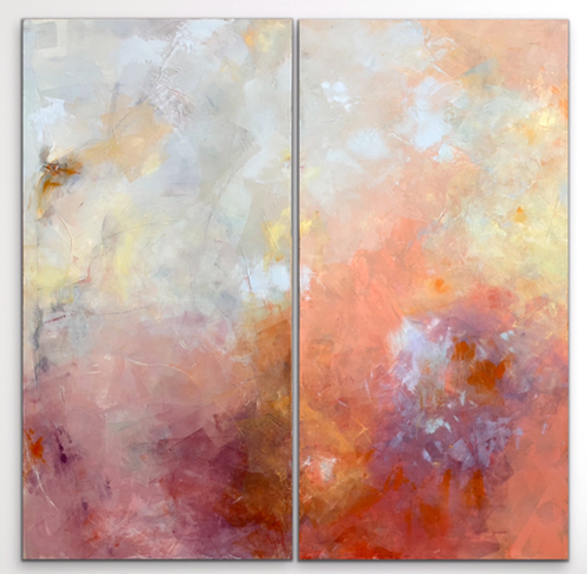 2 abstract panels with light blues, orange and other colors