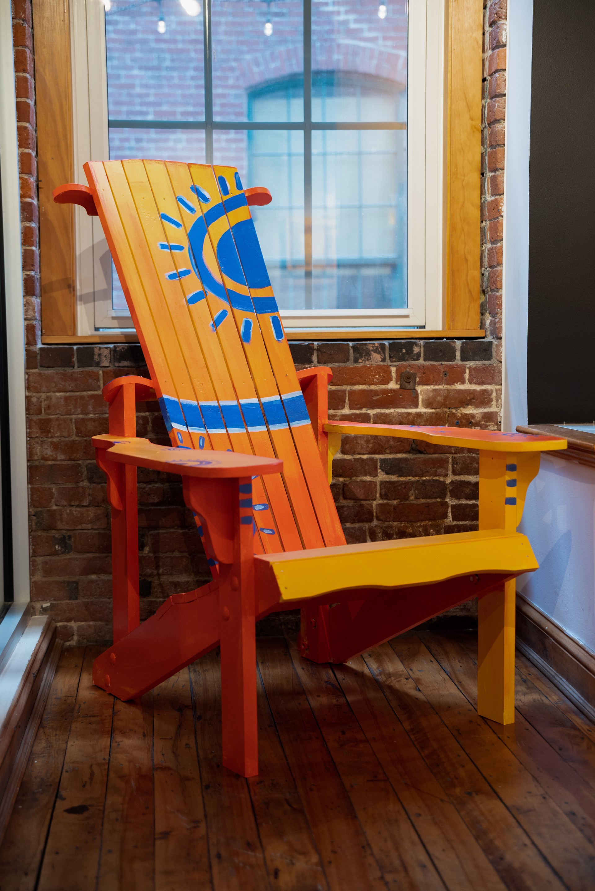 Hand-Painted Adirondack Chair with orange and yellow gradient and sun motif by EAC