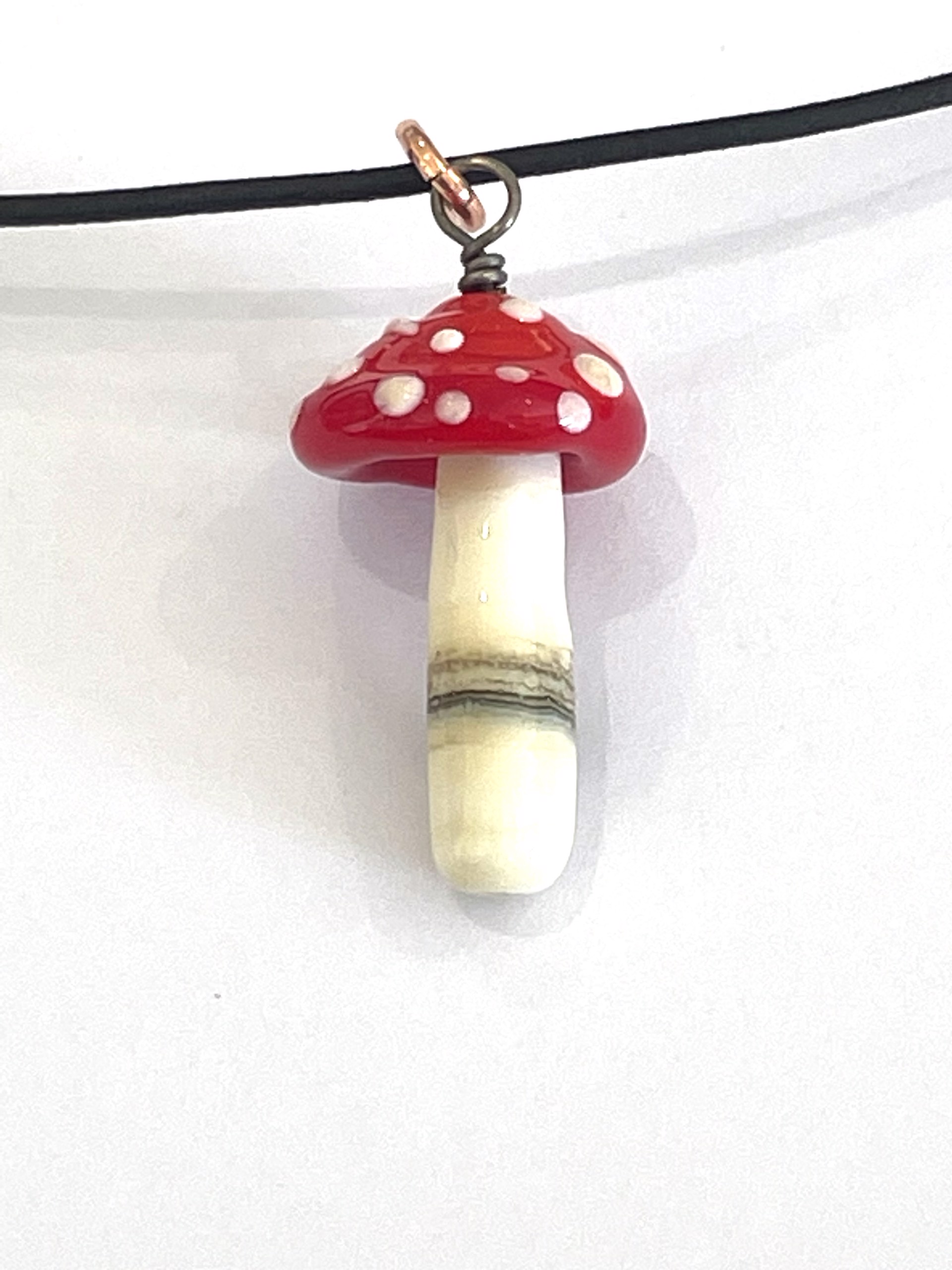 Red and White Mushroom Necklace by Emelie Hebert