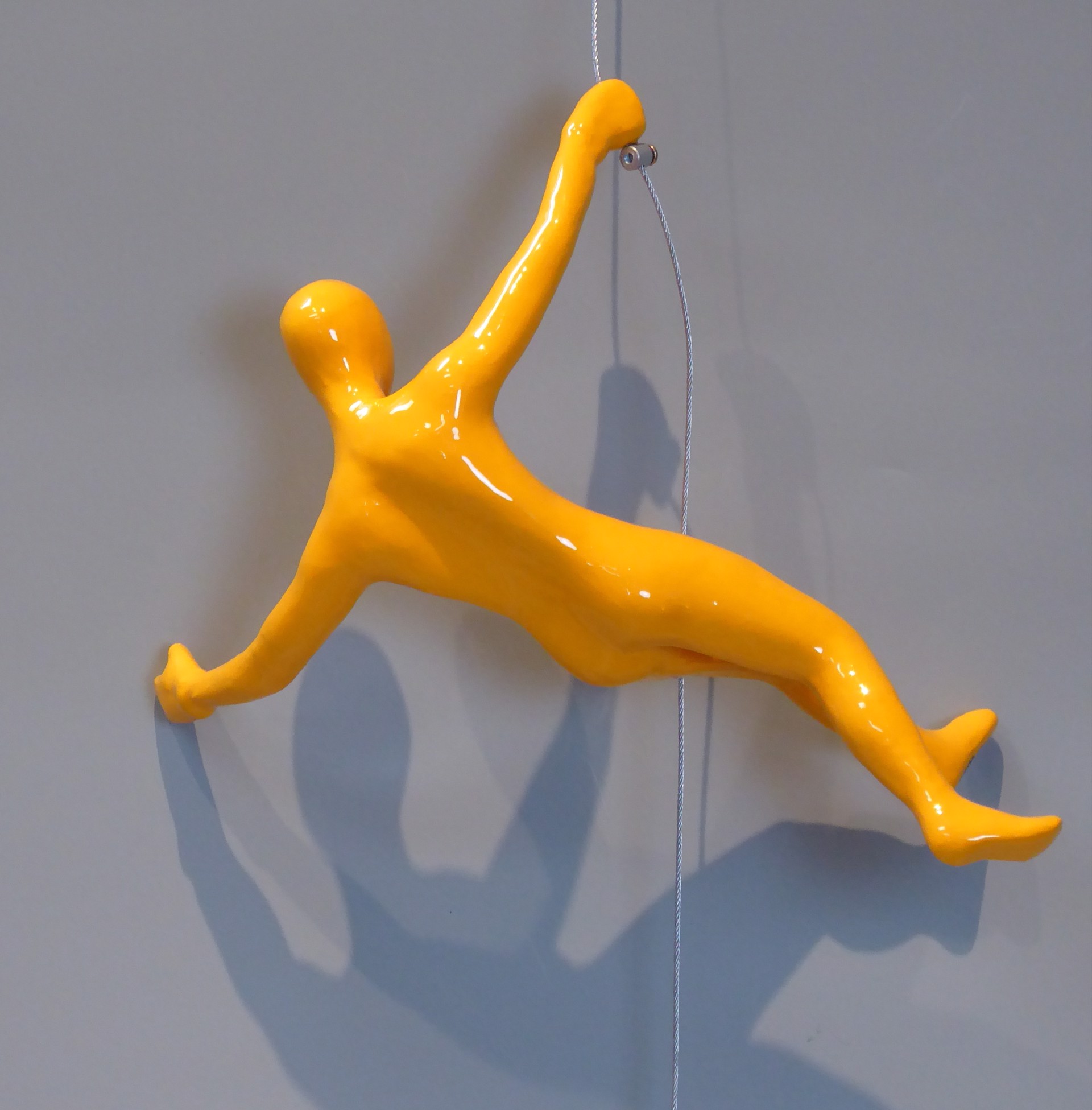 Male Climber Yellow by Ancizar Marin